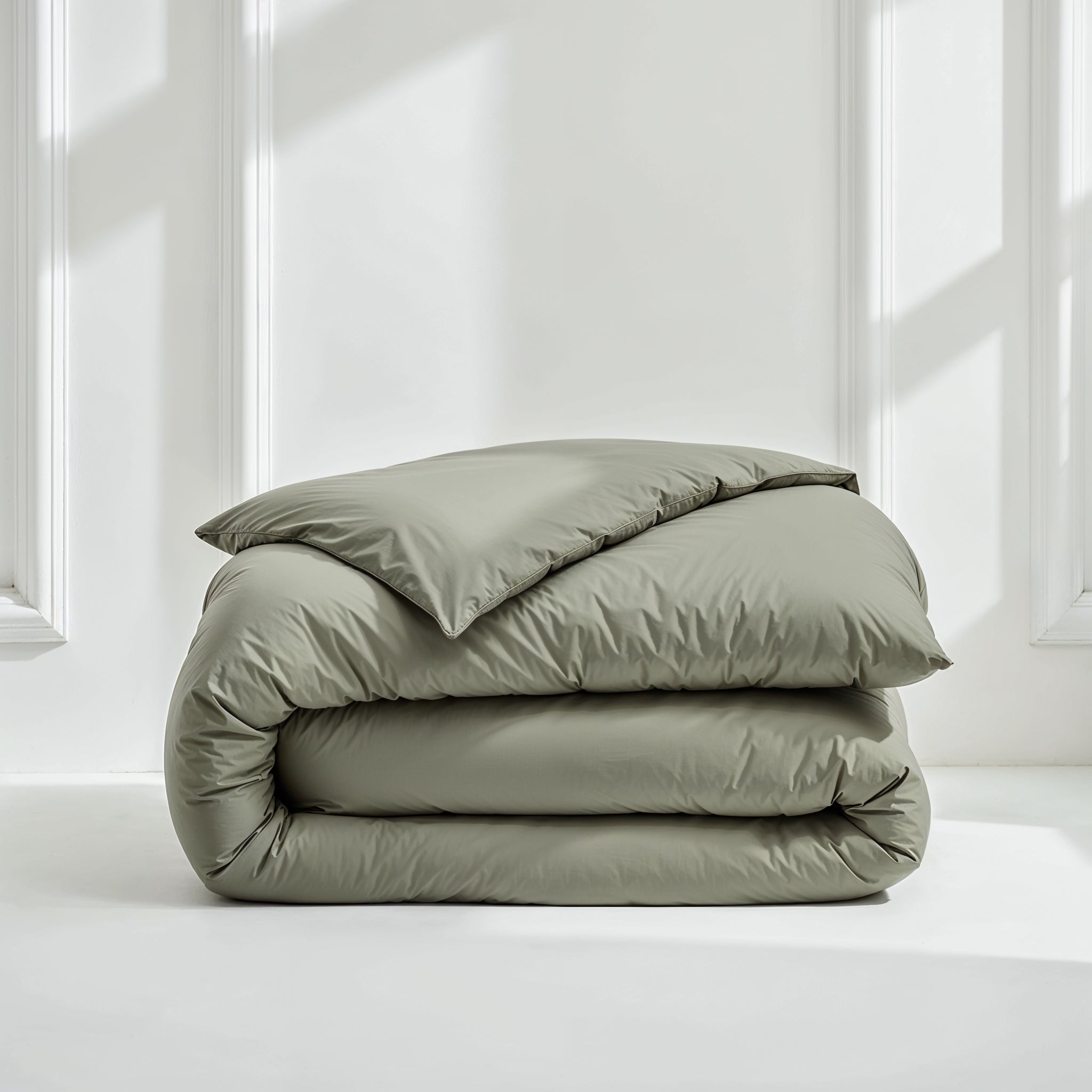 Moss green Luxe Australian Sateen duvet cover by Italic, showcasing smooth, high-quality bed linen with a luxurious finish.