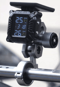 DX™ Solar Power Motorcycle TPMS monitor displaying tire pressure and temperature readings on a digital screen.