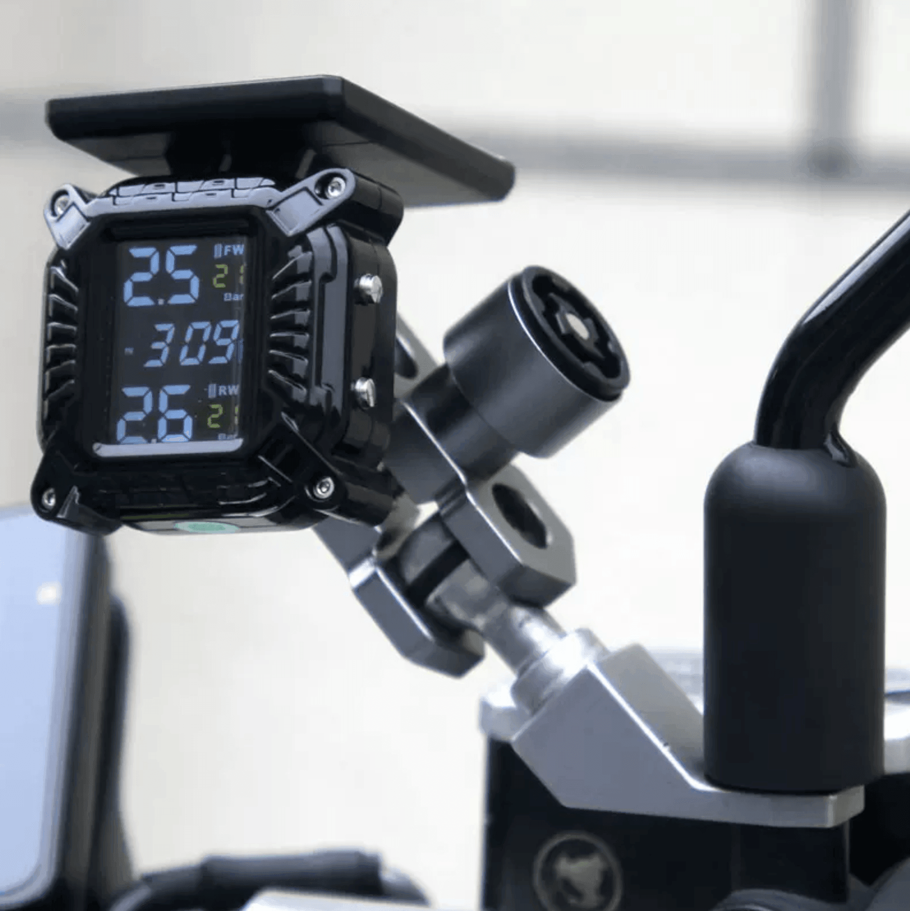 Bean's Moto Booth DX™ Solar Power Motorcycle TPMS displays tire pressure and temperature on a digital monitor for motorcycle safety.