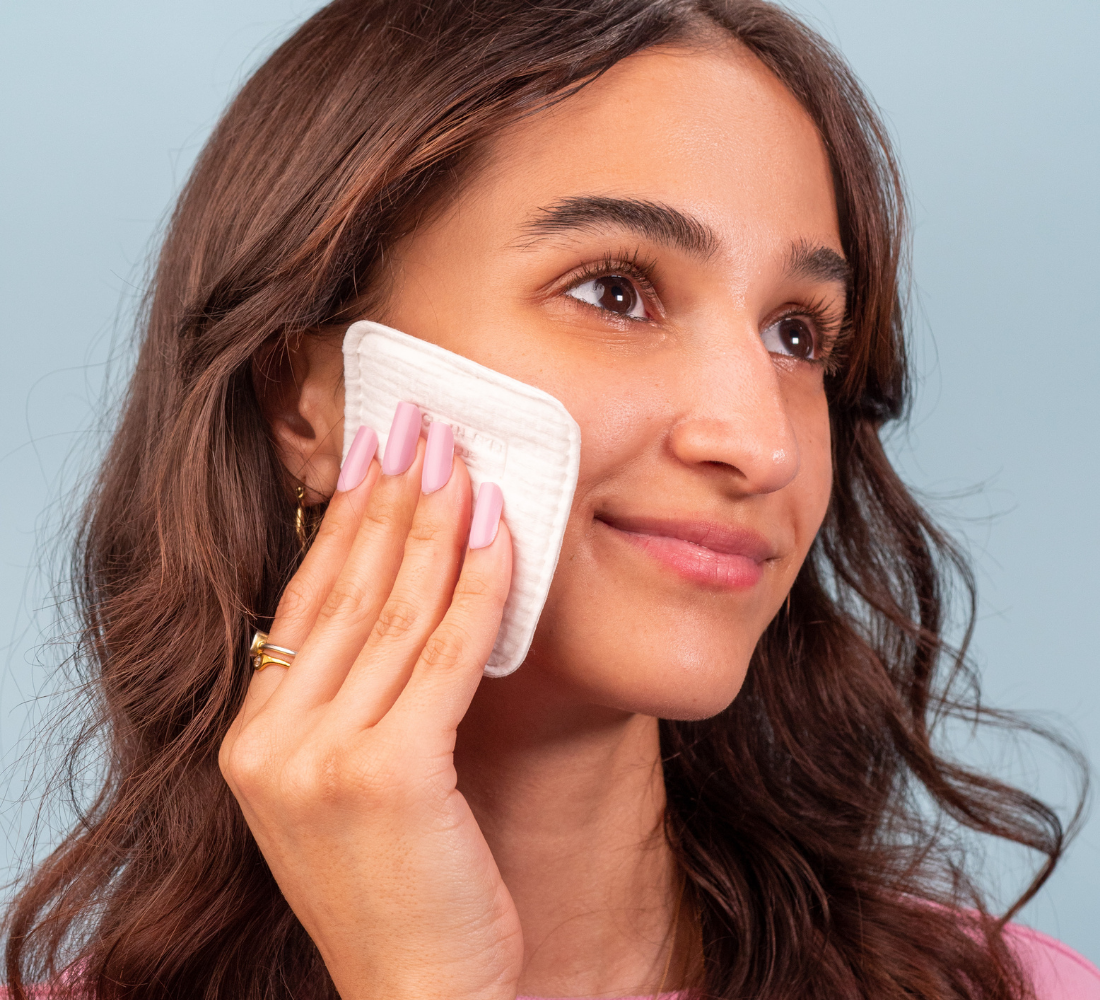 Alpenglow Clean2 Face Pads stacked on a surface, showcasing their soft texture and circular design for facial cleansing.