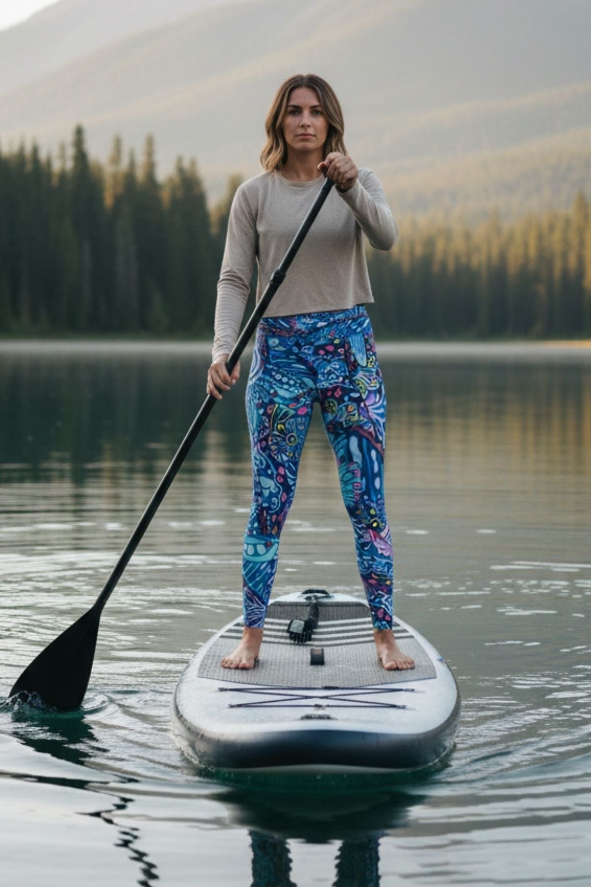 FisheWear Enchanted Grayling high-waisted leggings with a subtle gray and blue pattern, form-fitting and comfortable for active wear.