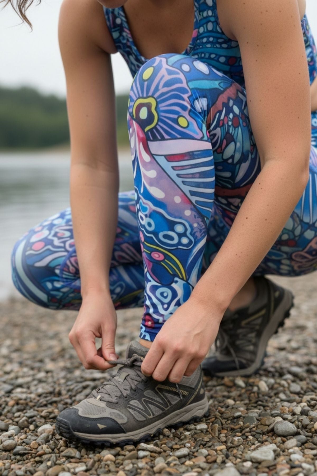 FisheWear Enchanted Grayling high-waisted leggings displayed on a model, showcasing their fitted design and subtle gray pattern.