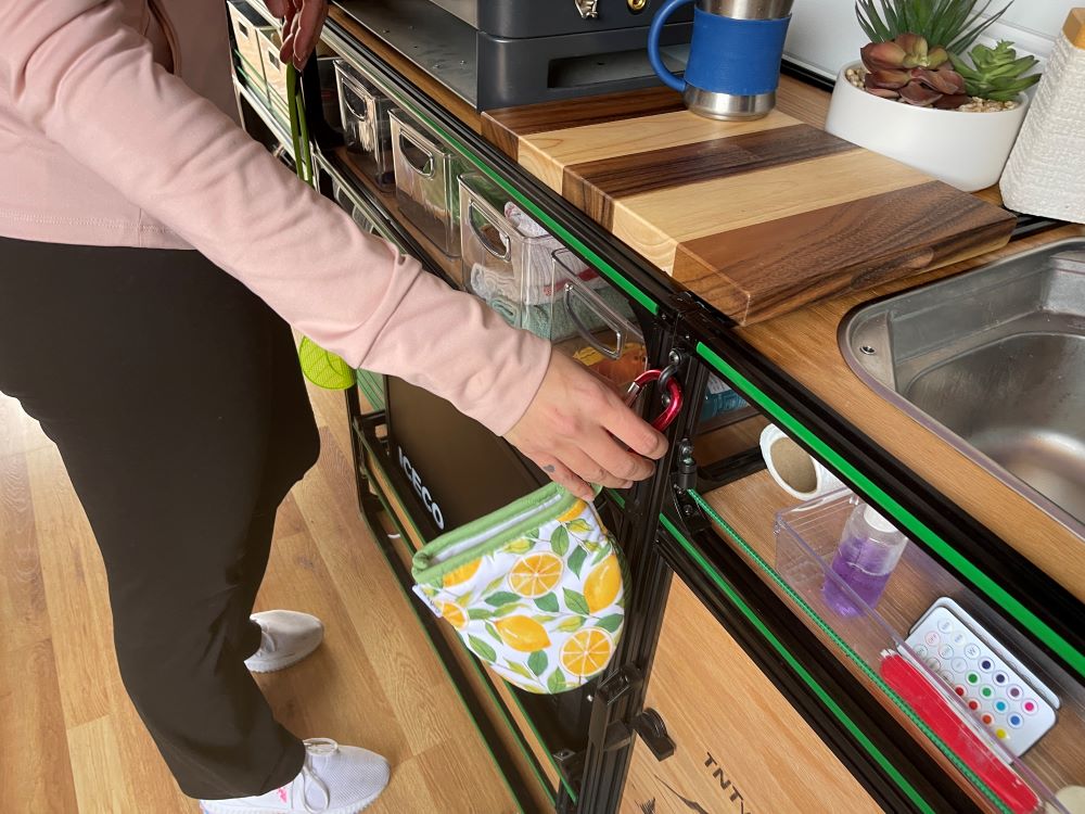 Eyelet ring on ice chest slide for Mercedes Sprinter 170 campervan conversion DIY kit by TNTvans, ideal for camper van upgrades.