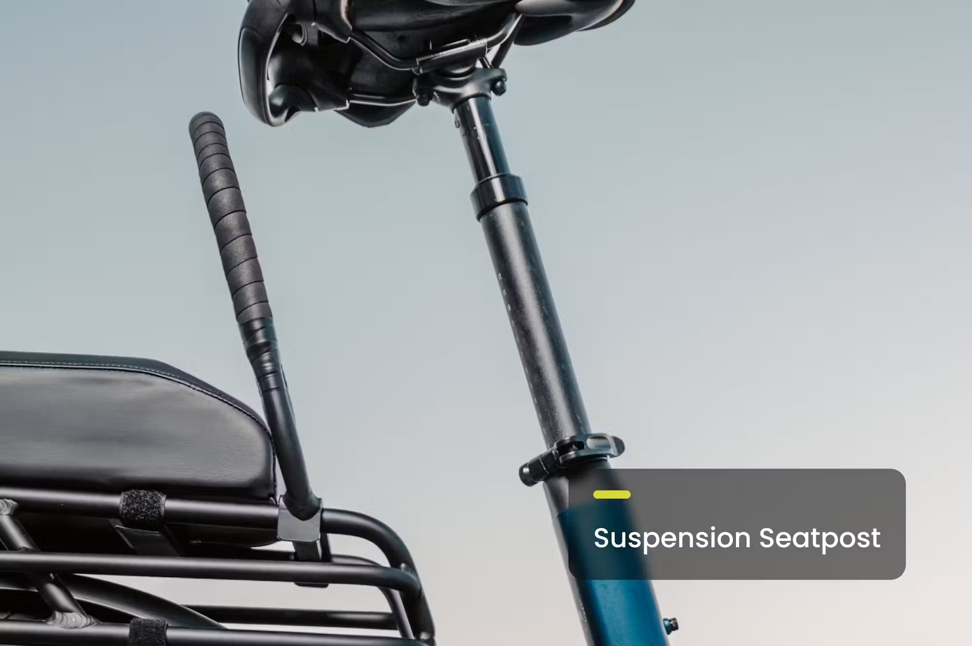 Rex E-Bikes Aventon Abound SR Cargo E-Bike with sturdy frame, cargo rack, and electric assist motor in a city street setting