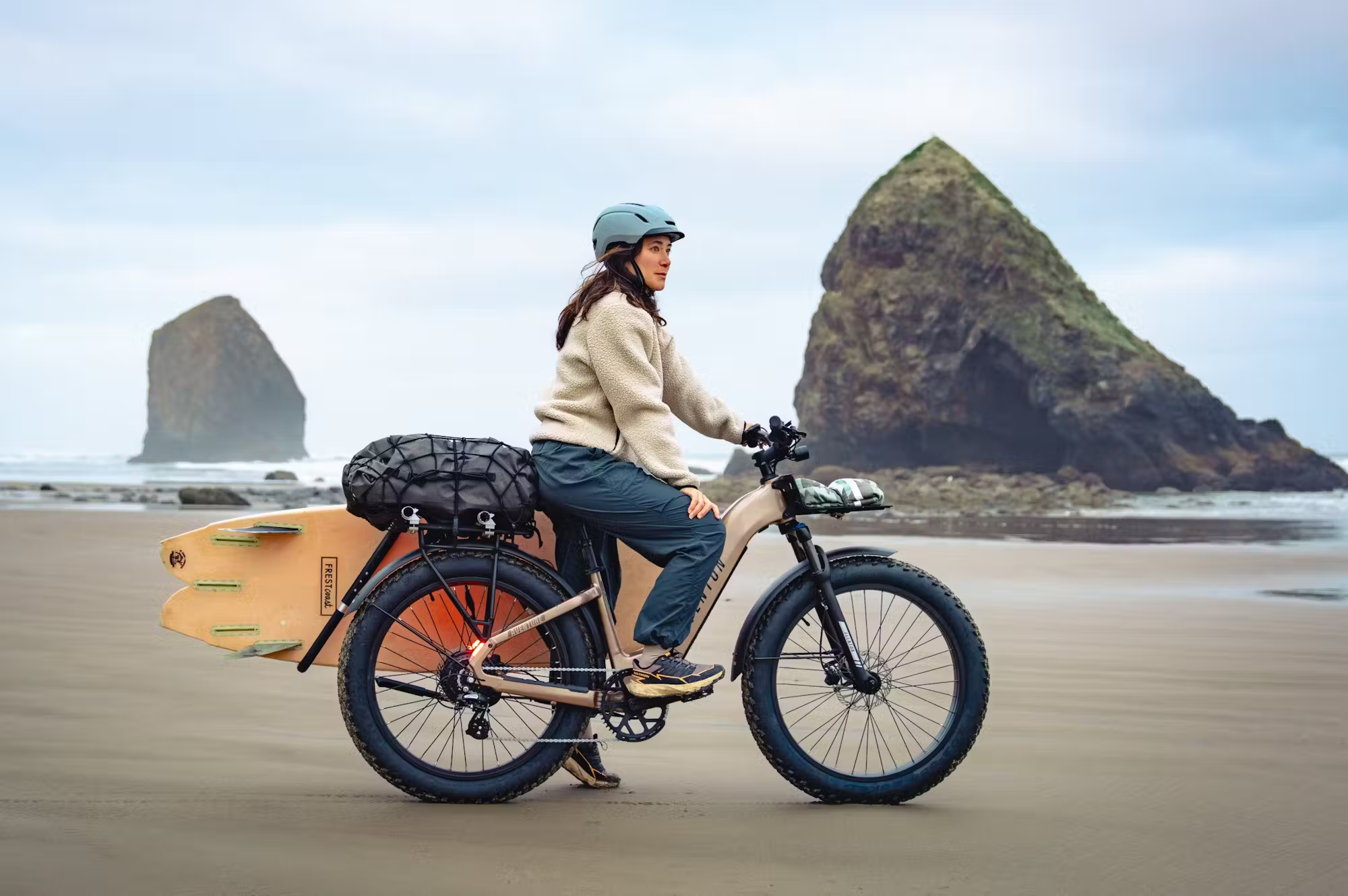 Rex E-Bikes Aventon Aventure.3 electric step-through e-bike with a sleek frame and handlebars, ready for urban riding.