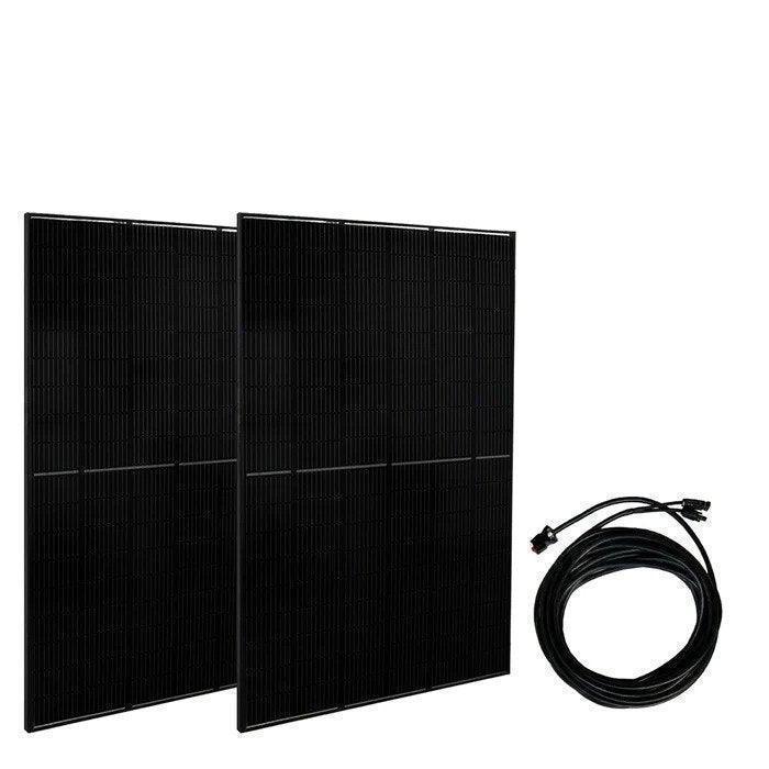 Green Vista Living Nature's Generator Powerhouse Gold PE solar generator kit with solar panels and accessories in an outdoor setting.