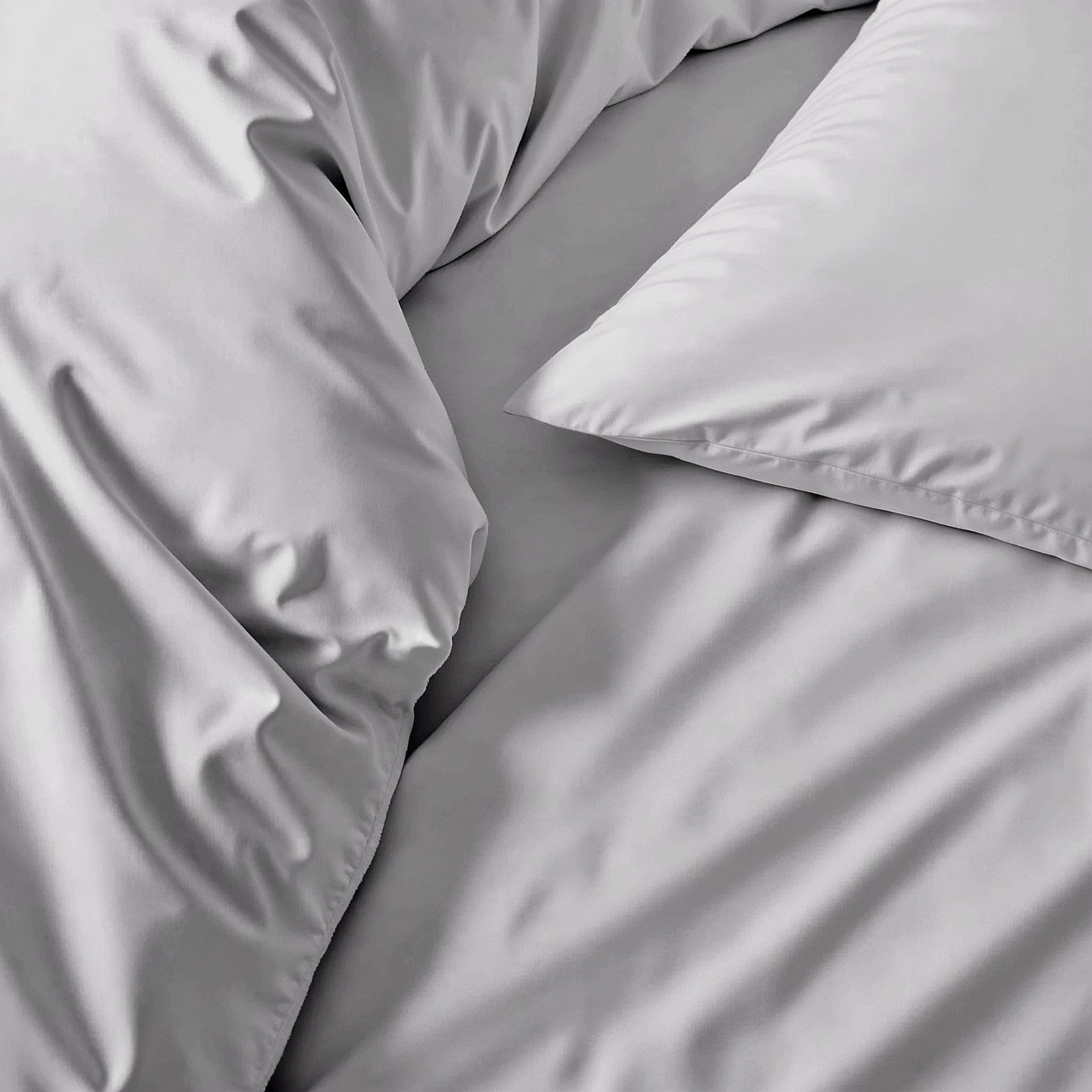 Luxurious Australian sateen duvet cover from Italic, showcasing smooth, glossy fabric and elegant design for a stylish bed.