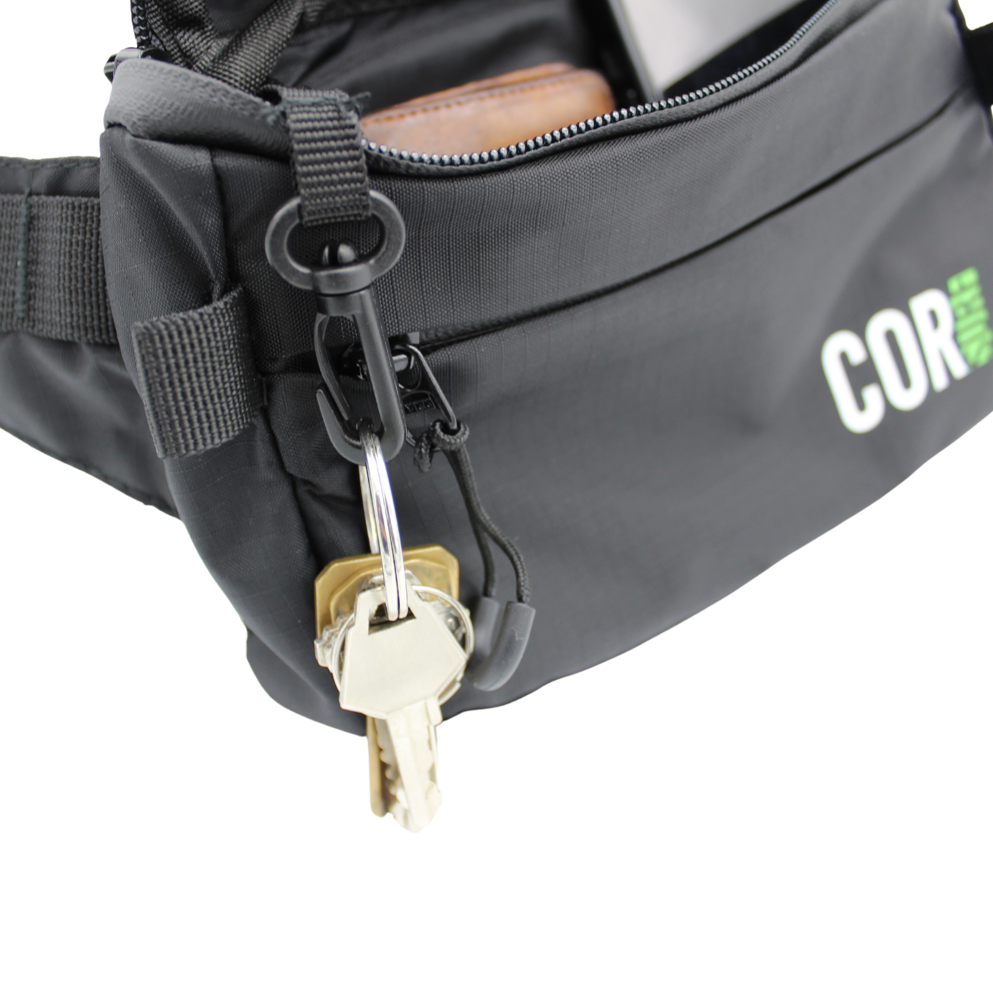 COR Surf The Daily Cross-Body hip pack with key clip, 1L fanny pack in durable material, designed for convenient everyday wear.