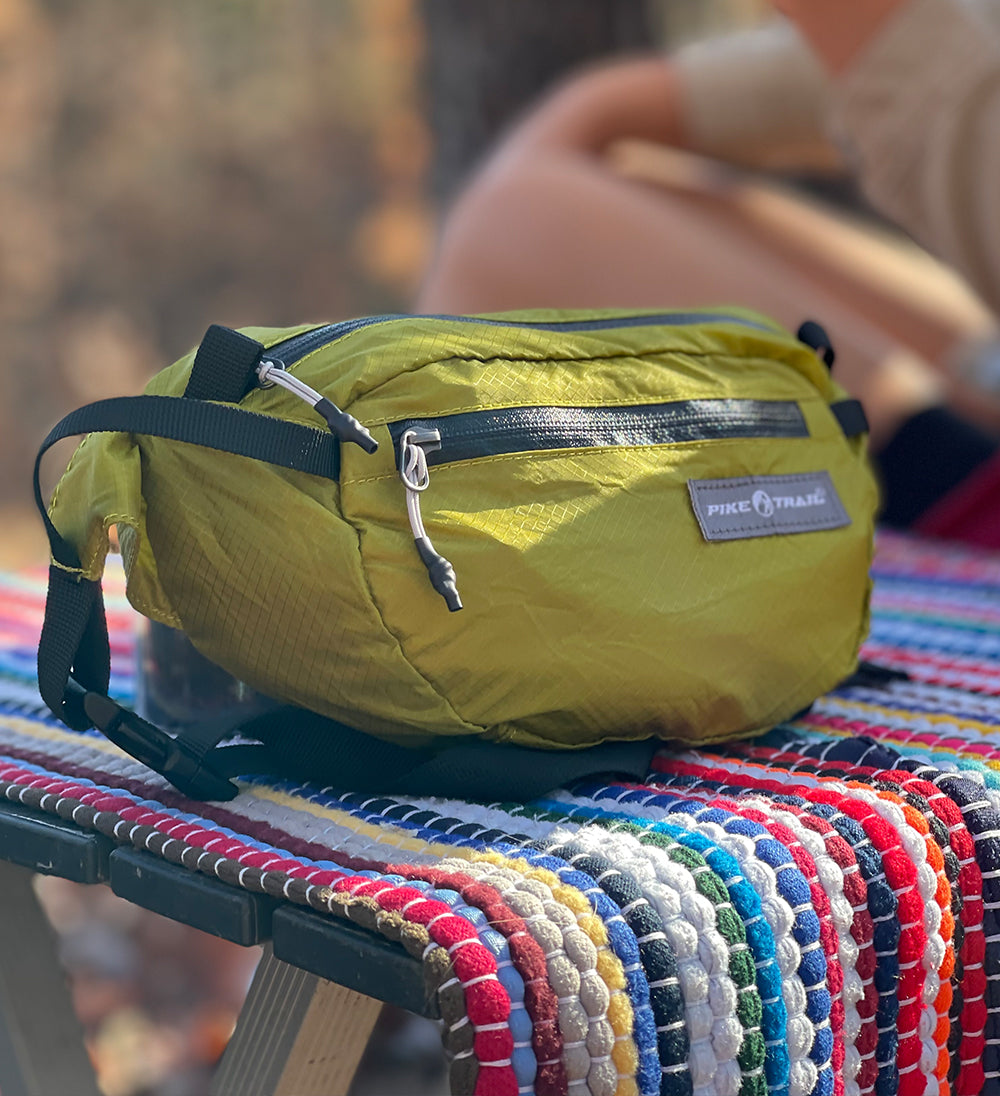 Pike Trail Fanny Pack with adjustable strap, multiple zippered compartments, and durable fabric, perfect for outdoor activities.