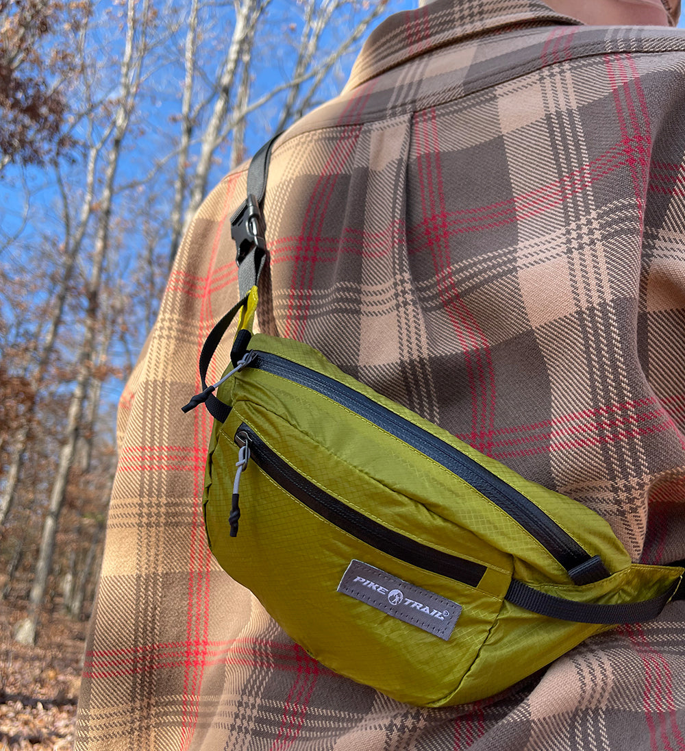 Pike Trail Fanny Pack with adjustable strap and multiple storage compartments, ideal for outdoor activities and casual wear.
