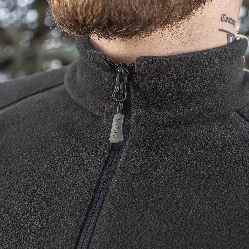 M-TAC Polartec fleece jacket in olive green, featuring a full zip and practical pockets for outdoor activities.