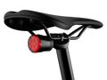Fenix BC06R Smart-Brake bicycle taillight mounted on a bike, showcasing its sleek design and bright LED features.