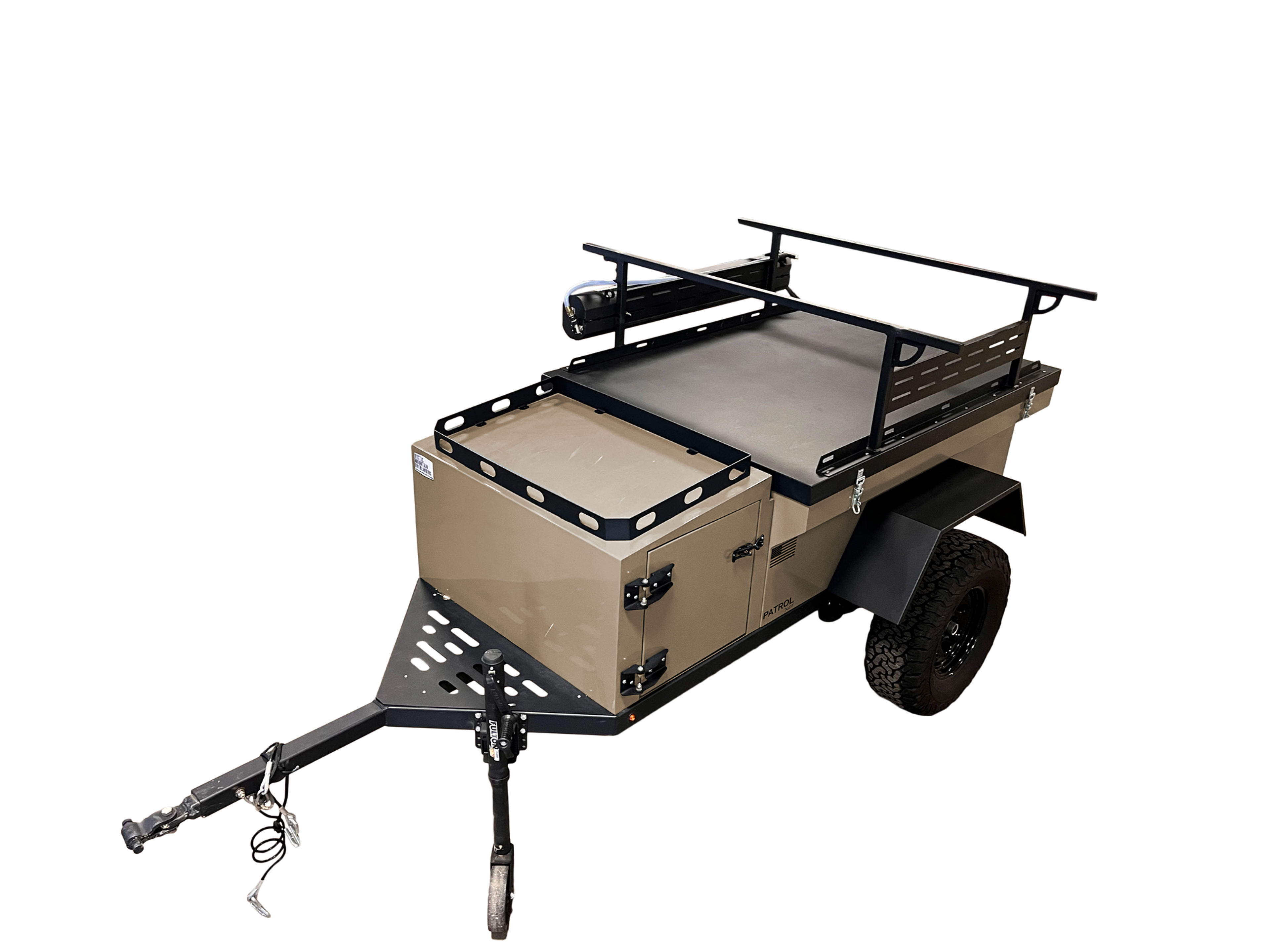 Rustic Mountain Overland PATROL XCT off-road trailer with rugged exterior and off-road tires, designed for overland adventures.