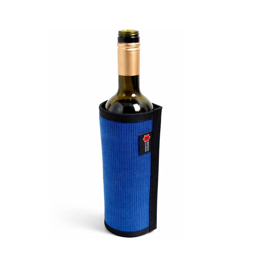 Blue Firehose Wine Bottle Cover by Recycled Firefighter, made from recycled firehose material, designed to protect and stylishly cover wine bottles.