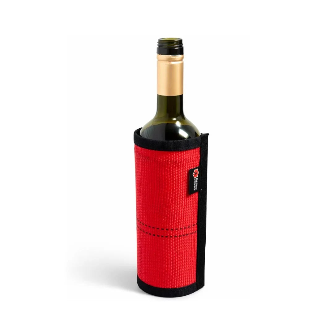 Red Firehose Wine Bottle Cover by Recycled Firefighter, made from recycled firehose material, designed to protect and style wine bottles.