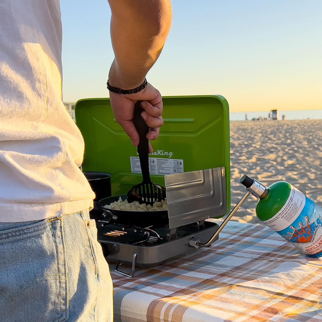 Flame King 2-burner portable propane gas camping stove grill with two burners and a sturdy design for outdoor cooking.