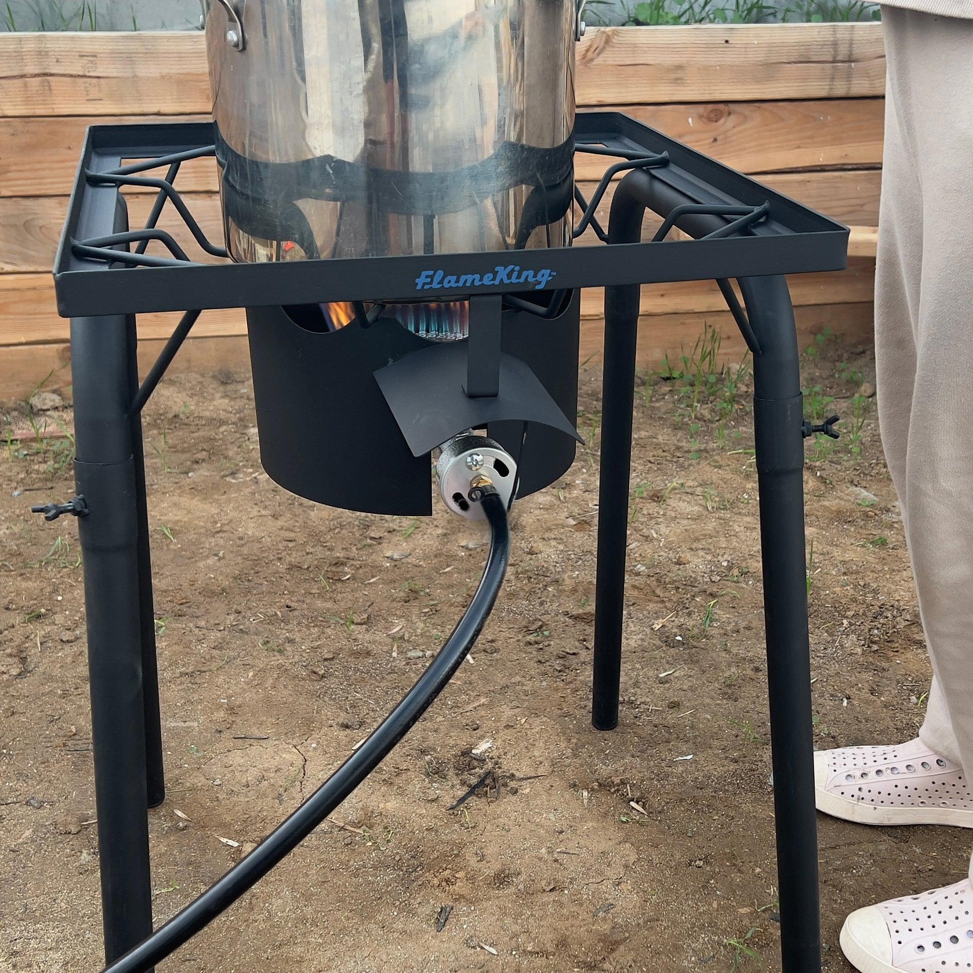 Heavy-duty Flame King 100,000 BTU propane gas camping single burner cooker with sturdy metal construction and control knob