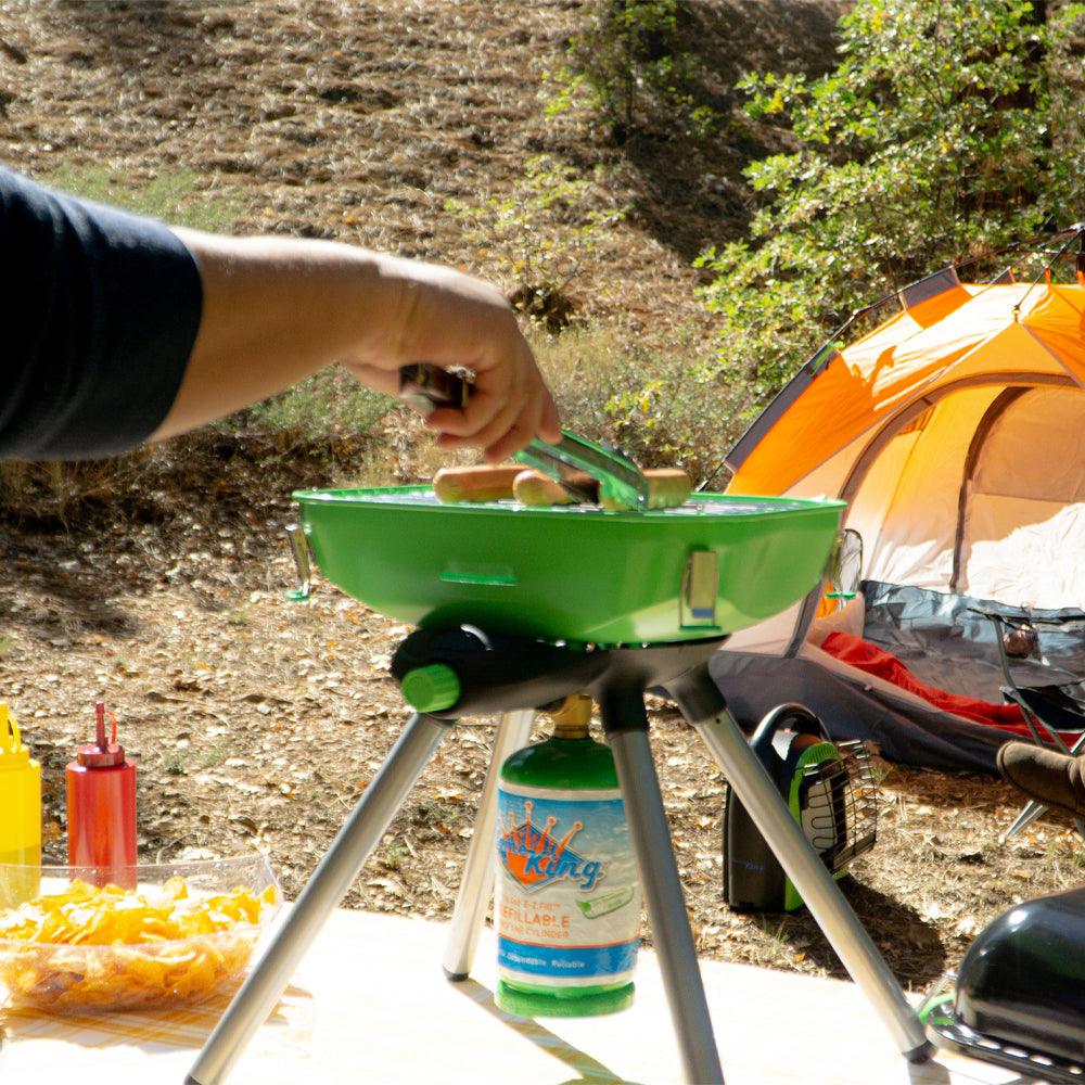 Portable Flame King camping BBQ grill and camp stove with multiple functions, ideal for outdoor cooking and camping trips.
