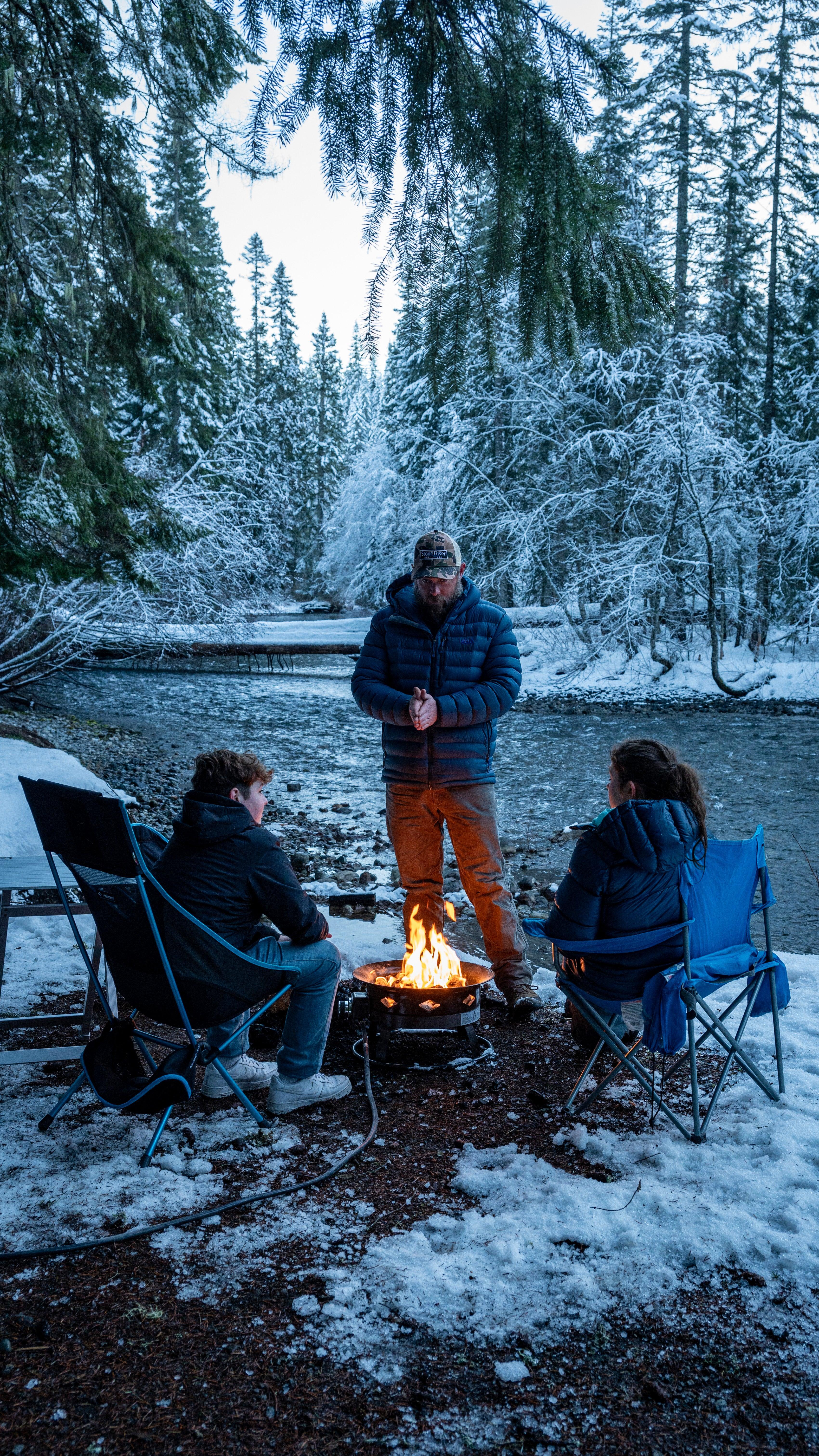 Flame King outdoor portable propane fire pit bowl with self-igniter, cover, and carry straps for home and garden use.