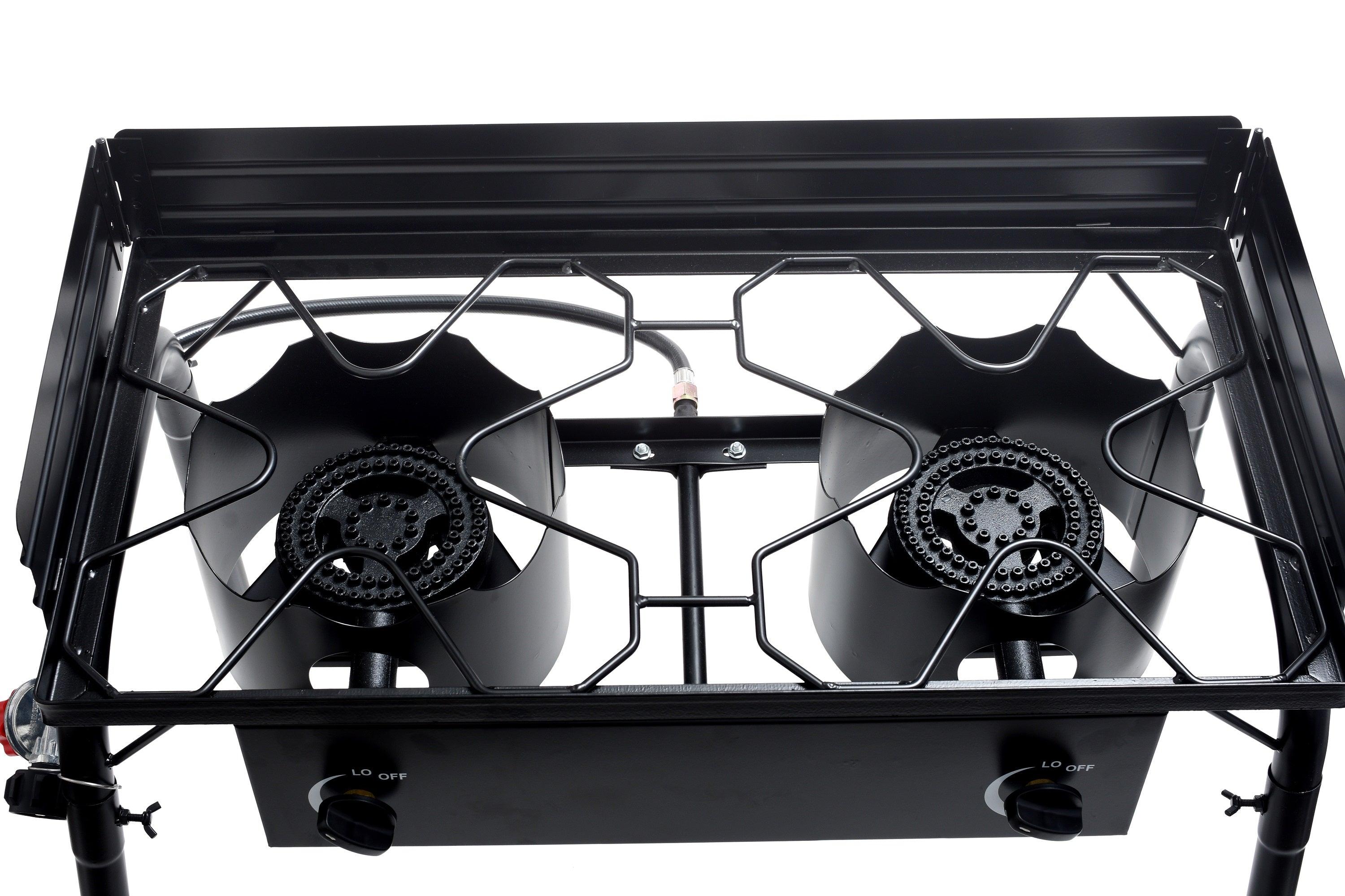 Flame King outdoor propane double burner camping stove with sturdy metal frame and two large burners for outdoor cooking.