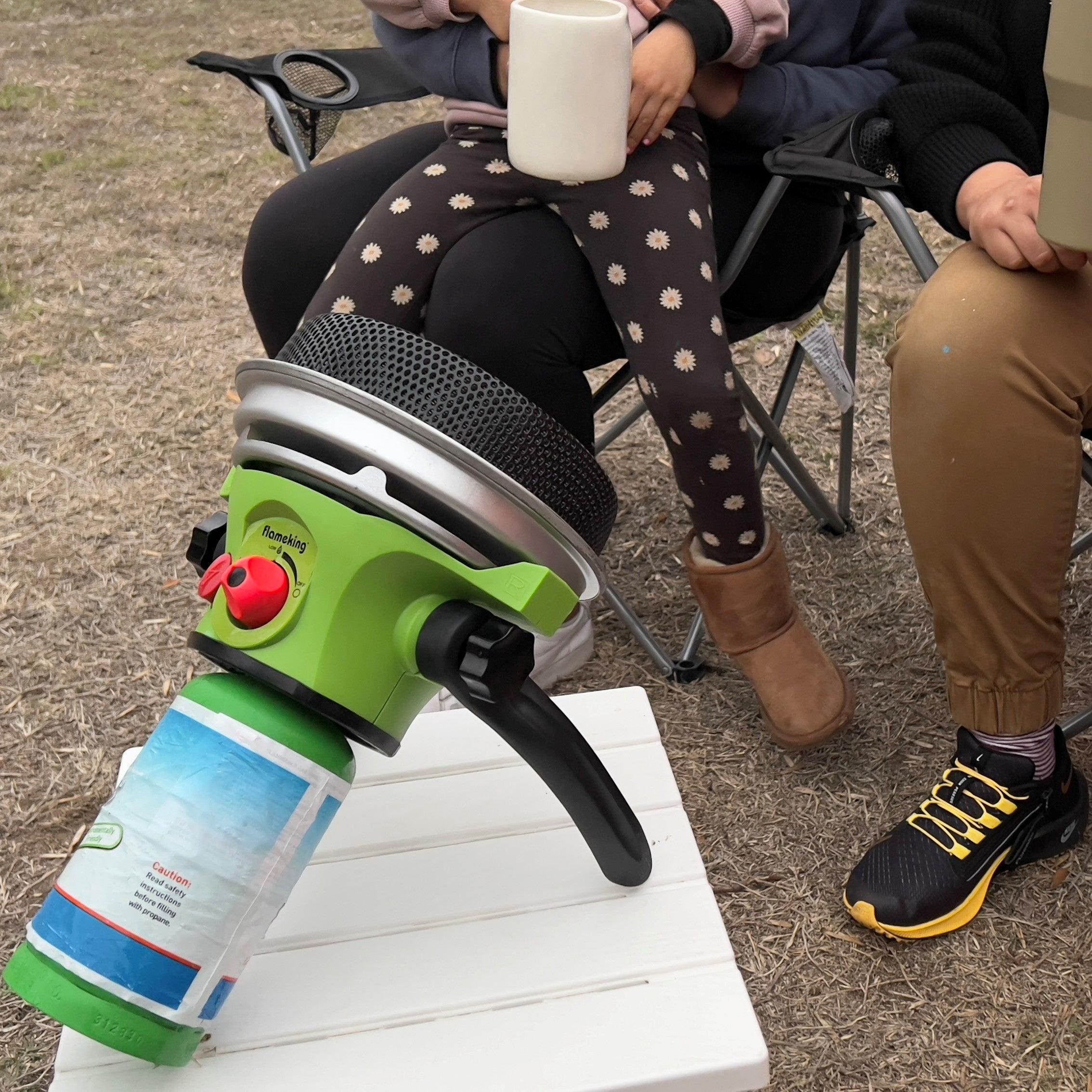 Portable Flame King propane outdoor heater with piezo electric start, ideal for camping and outdoor warmth.