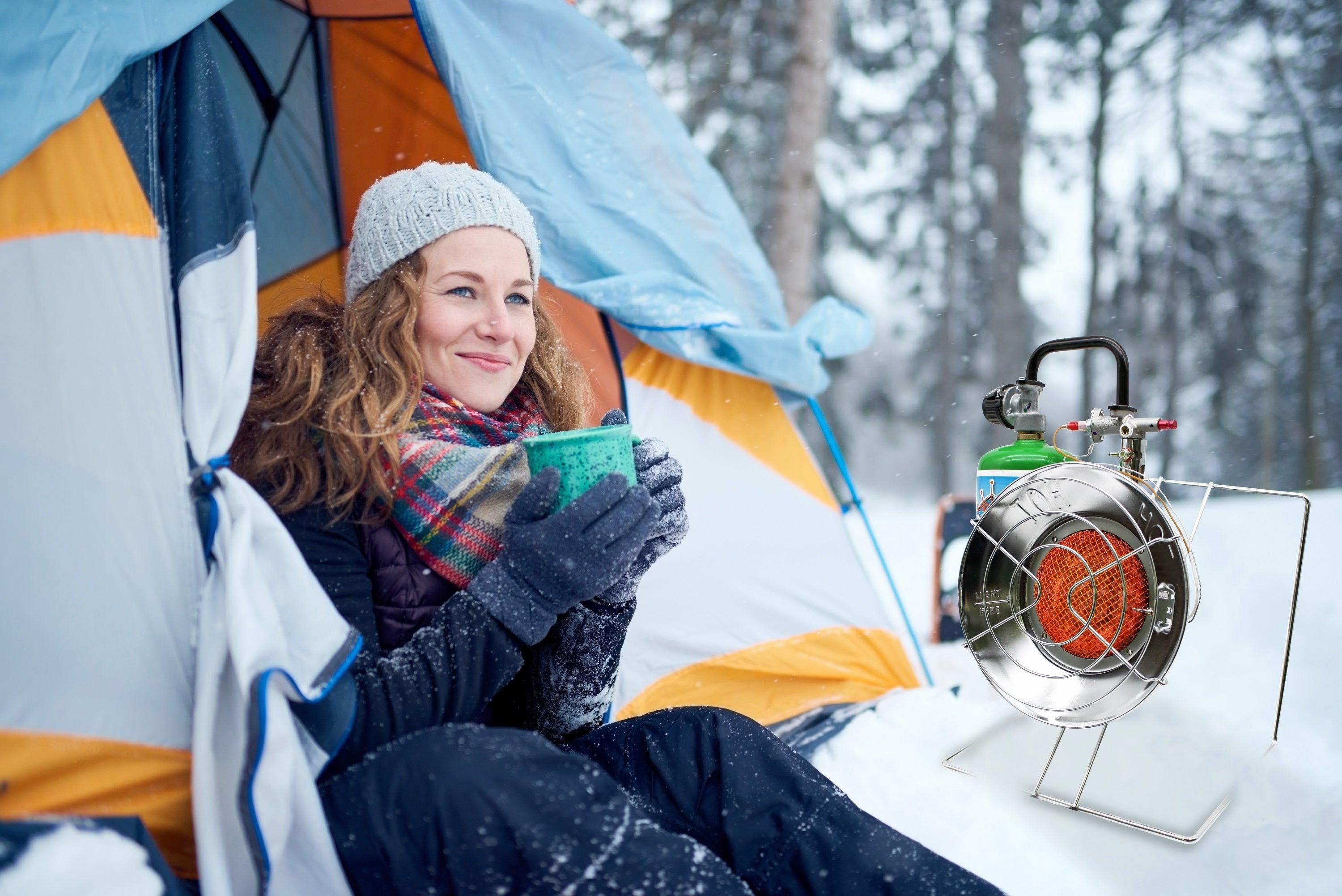 Flame King portable multi-use camping burner and heater with metal frame and control knob for outdoor cooking and heating.