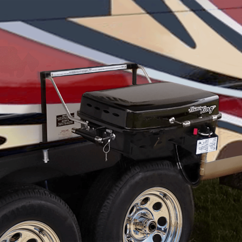 Flame King RV trailer mounted grill BBQ with carry bag, showcasing portable design and sturdy construction for outdoor cooking.