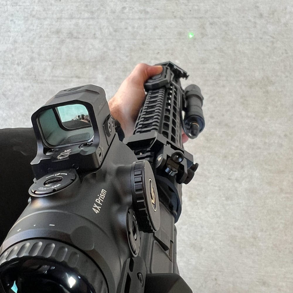SFT2 Tactical RM19 Tac-Light weapon light laser mounted on firearm for tactical use, featuring bright flashlight and laser sight.
