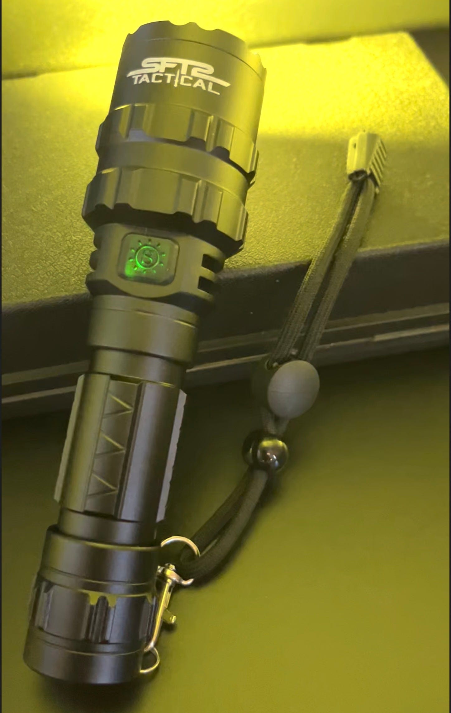 SFT2 Tactical multi-color flashlight with 1600 lumens, designed for mounted use in various outdoor settings.