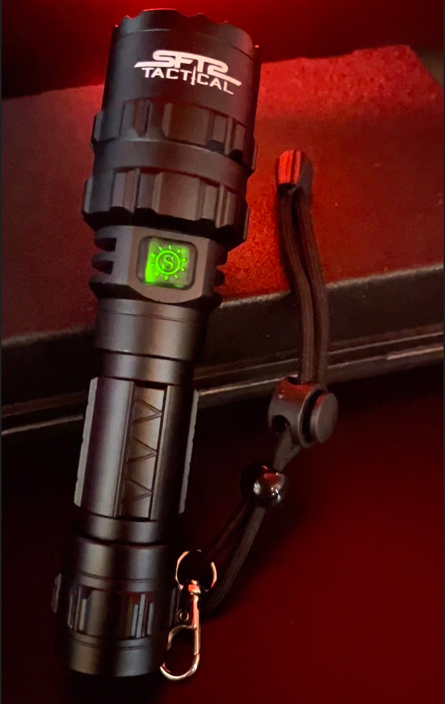 SFT2 Tactical multi-color flashlight emitting bright 1600 lumens, designed for versatile mounted light use.