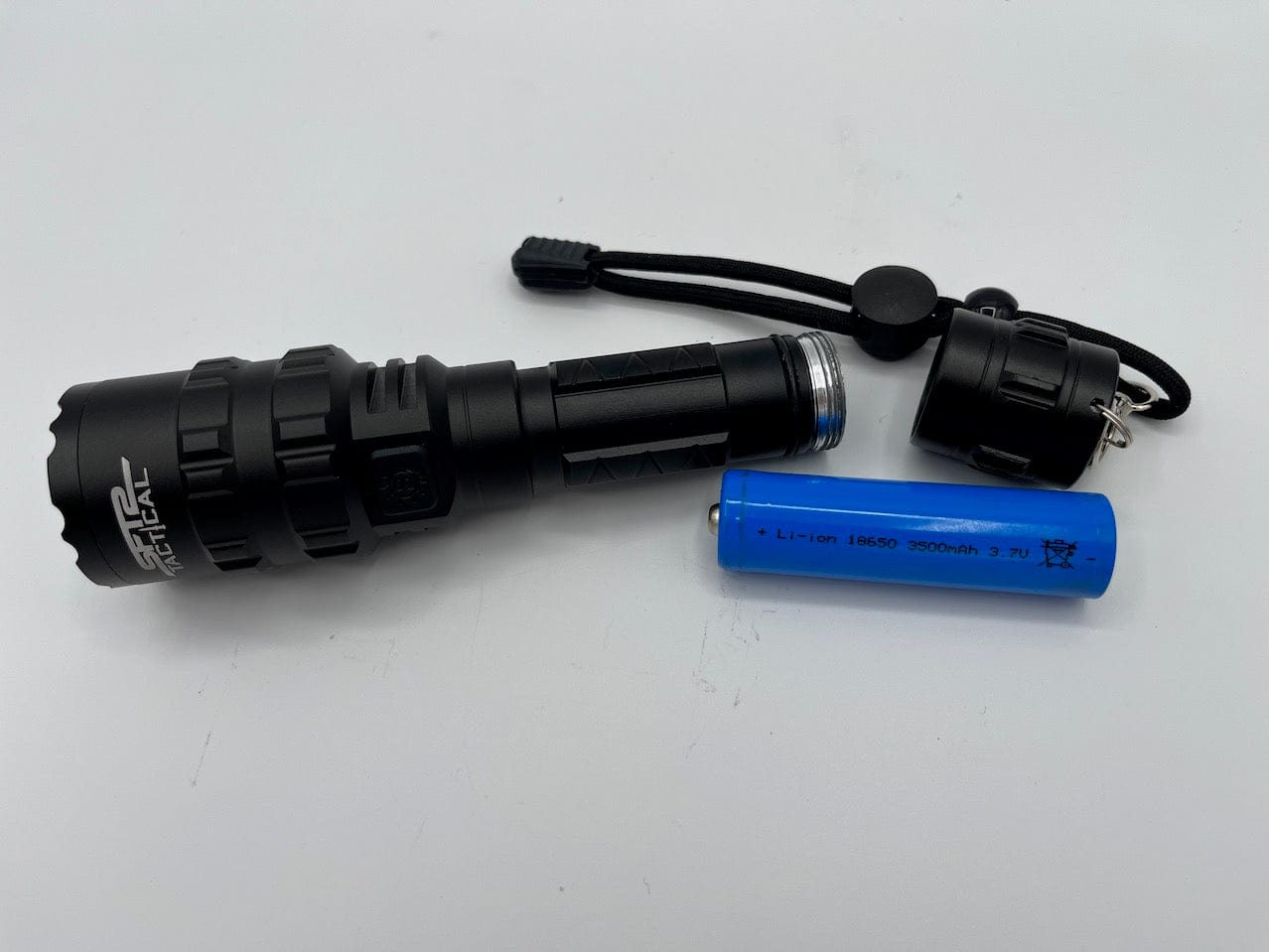SFT2 Tactical multi-color flashlight with 1600 lumens, showcasing a durable design and various light settings.