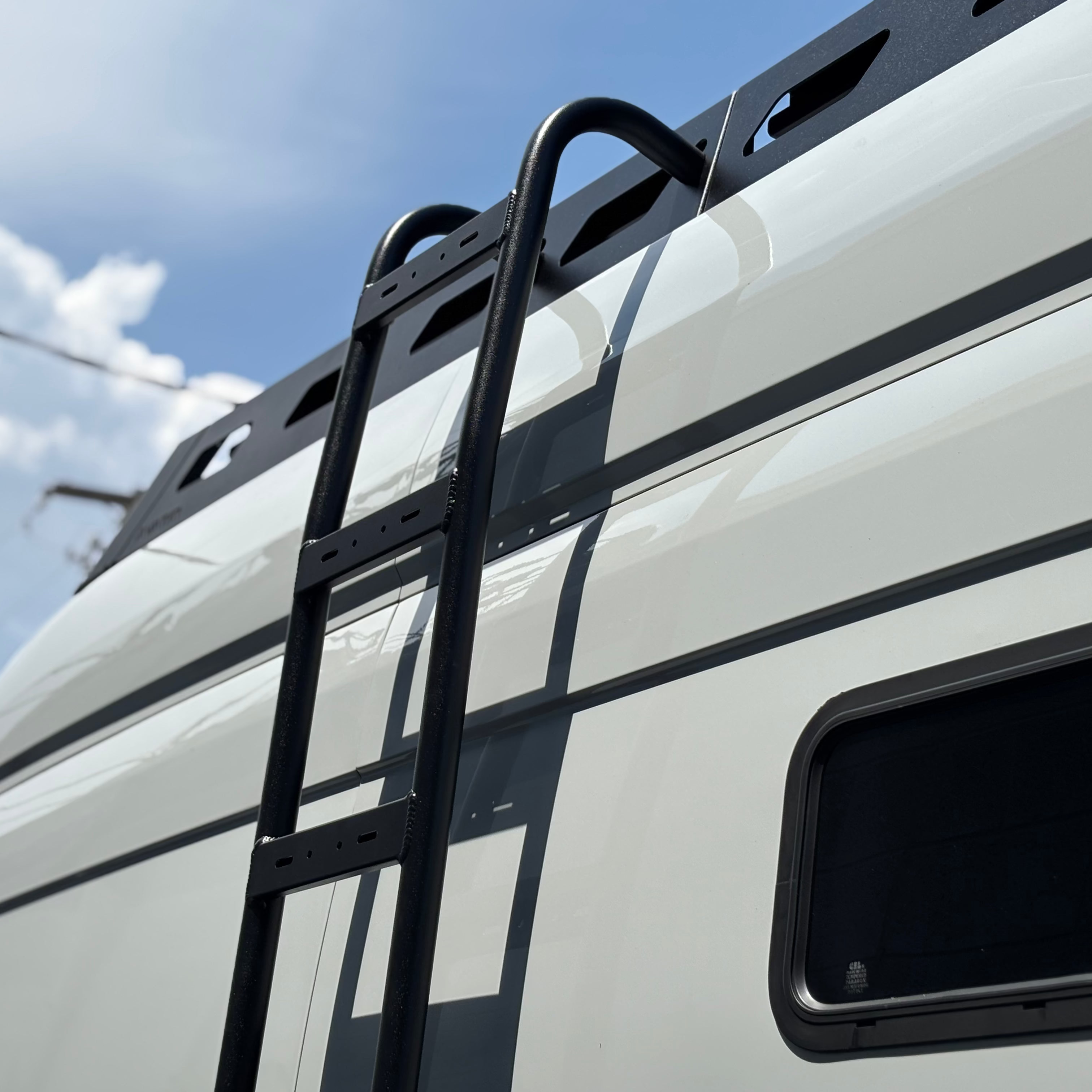 Avatar Offroad Pioneer Transit Roof Rack installed on a vehicle, showcasing its sturdy design and ample cargo space for outdoor adventures.