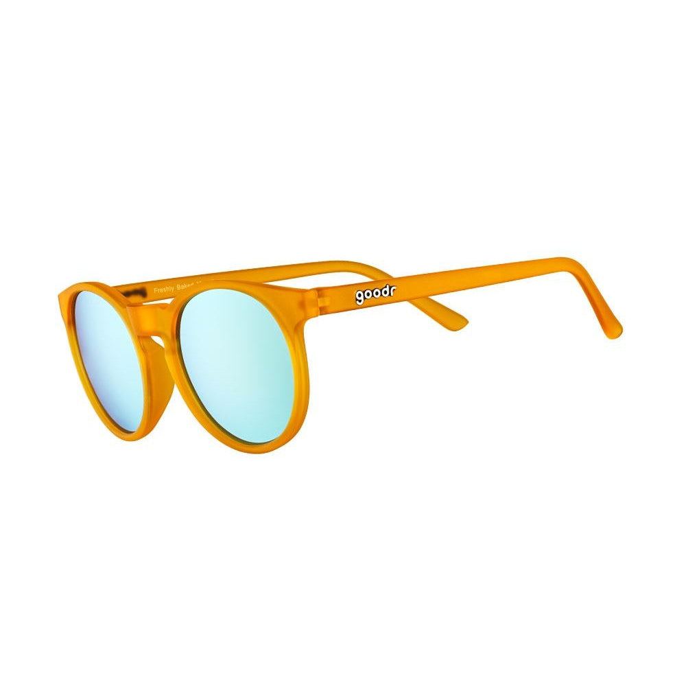 Freshly Baked Man Buns circle polarized sunglasses by Rare Air Discs, shown from the side with sleek black frames and tinted lenses.