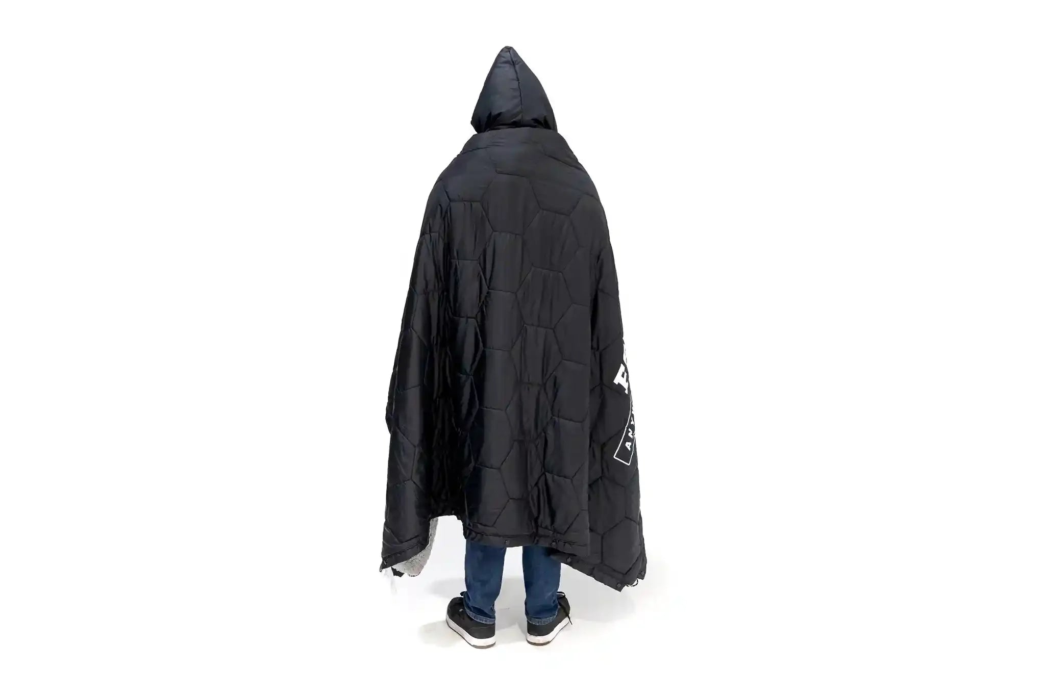 Freespirit Recreation Anywhere Poncho camping blanket, made of warm, durable outerwear fabric, shown from the back.