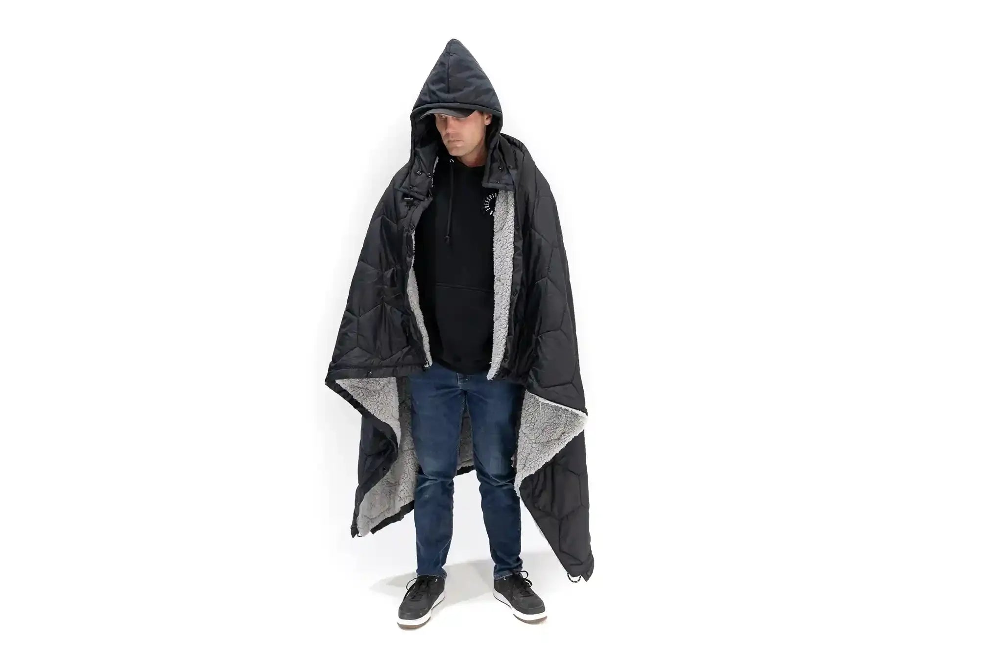 Freespirit Recreation Anywhere Poncho in hooded design, featuring a cozy puff blanket outerwear for outdoor warmth and comfort.