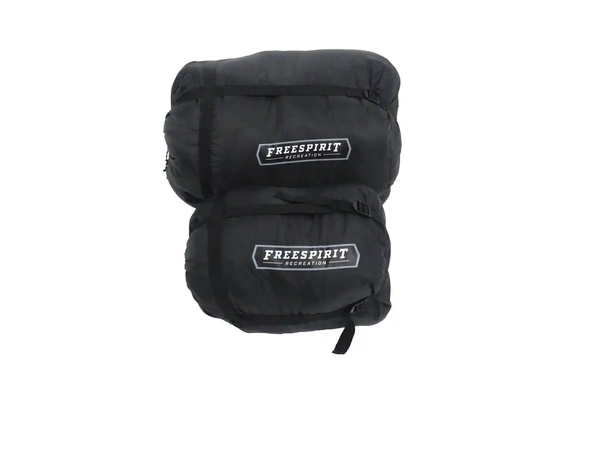 Freespirit Recreation sleeping bag in a rooftop tent, shown with camping bedding and storage bag outdoors.