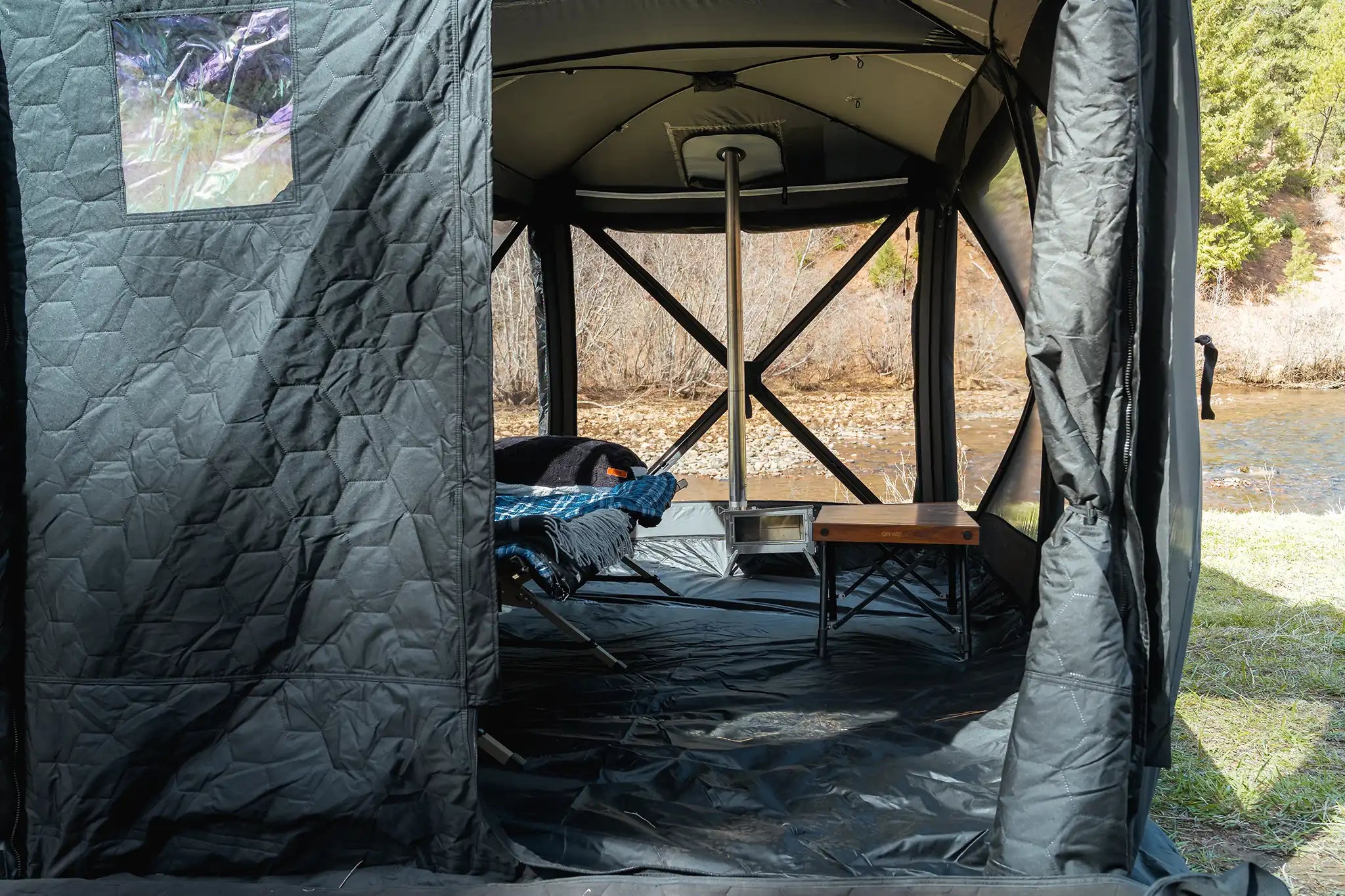 Freespirit Recreation Hub 4 Double Tent set up outdoors, showcasing spacious design and durable fabric for camping.