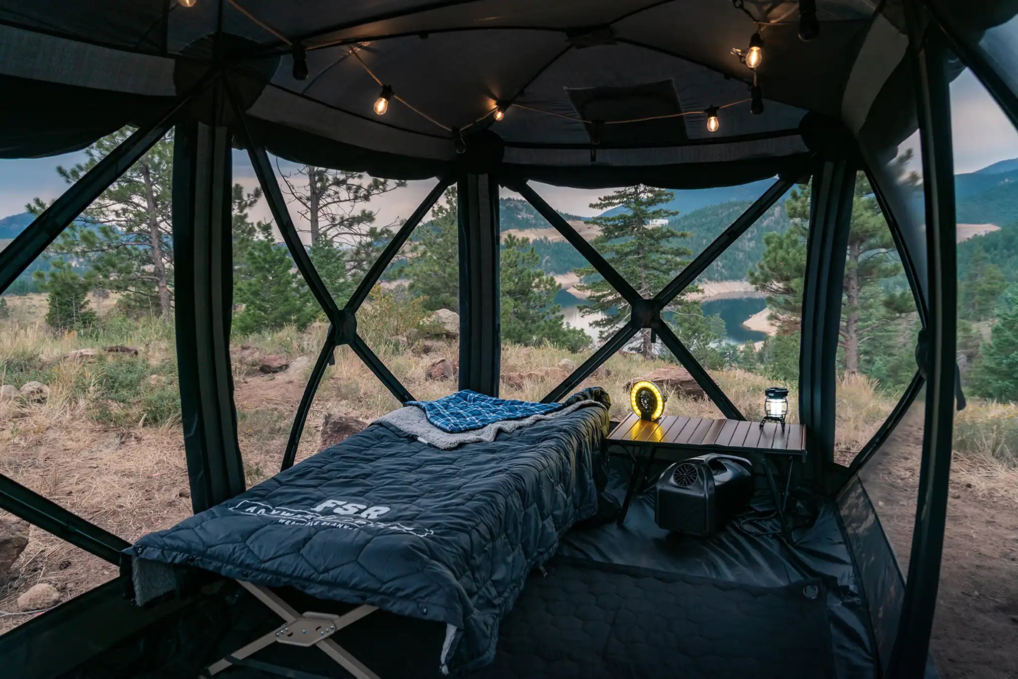 Freespirit Recreation Hub 4 Double Tent set up, showcasing spacious interior and vibrant design for camping adventures.