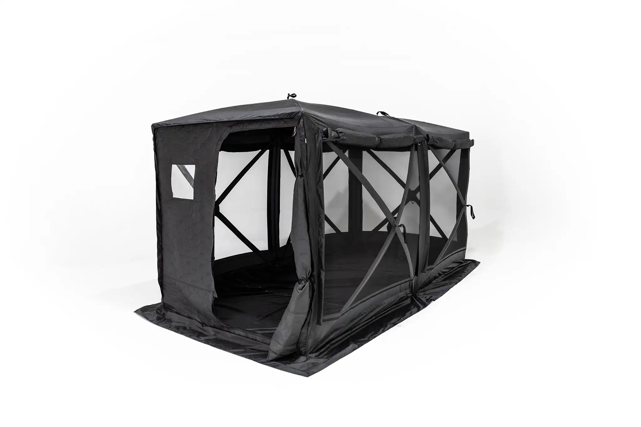 Freespirit Recreation Hub 4 Double Tent set up in a scenic campsite, showcasing its spacious interior and durable design.