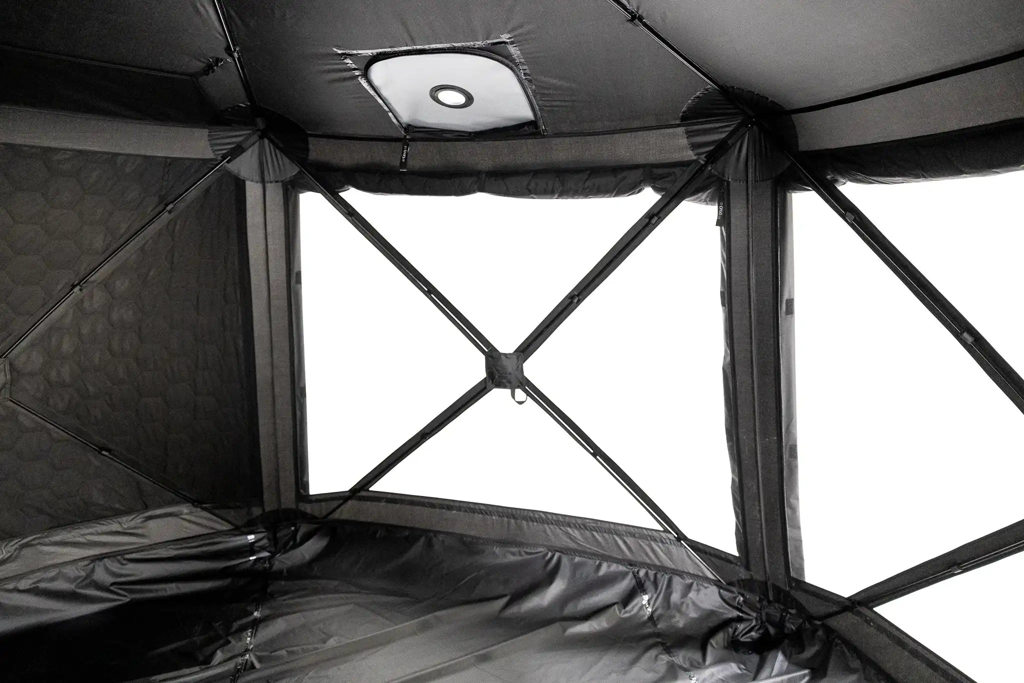 Interior view of the Freespirit Recreation Hub 6XL Tent showcasing spacious design and comfortable camping features.