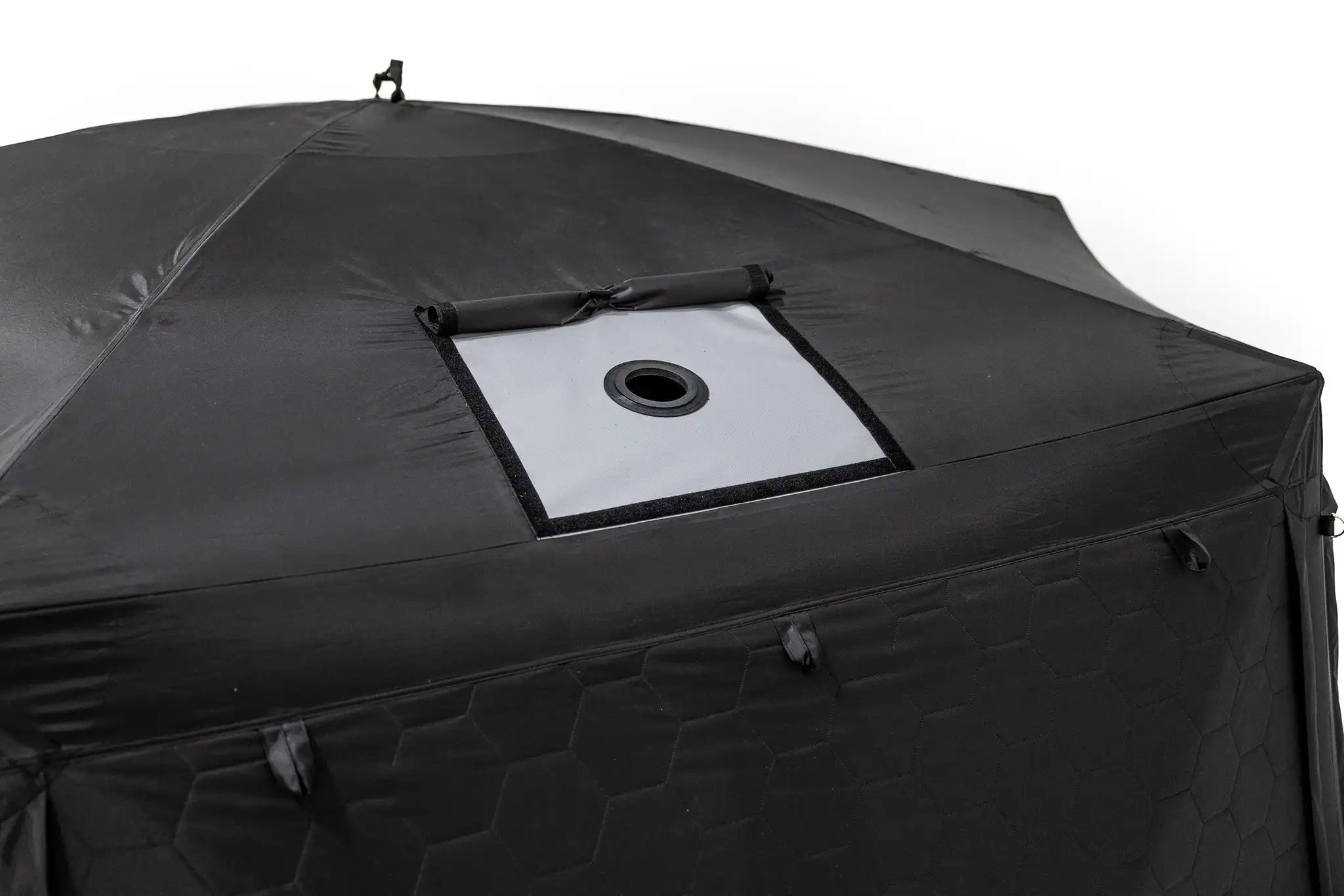 Freespirit Recreation Hub 6XL tent with pop-up design, spacious interior, and stove port for camping adventures.