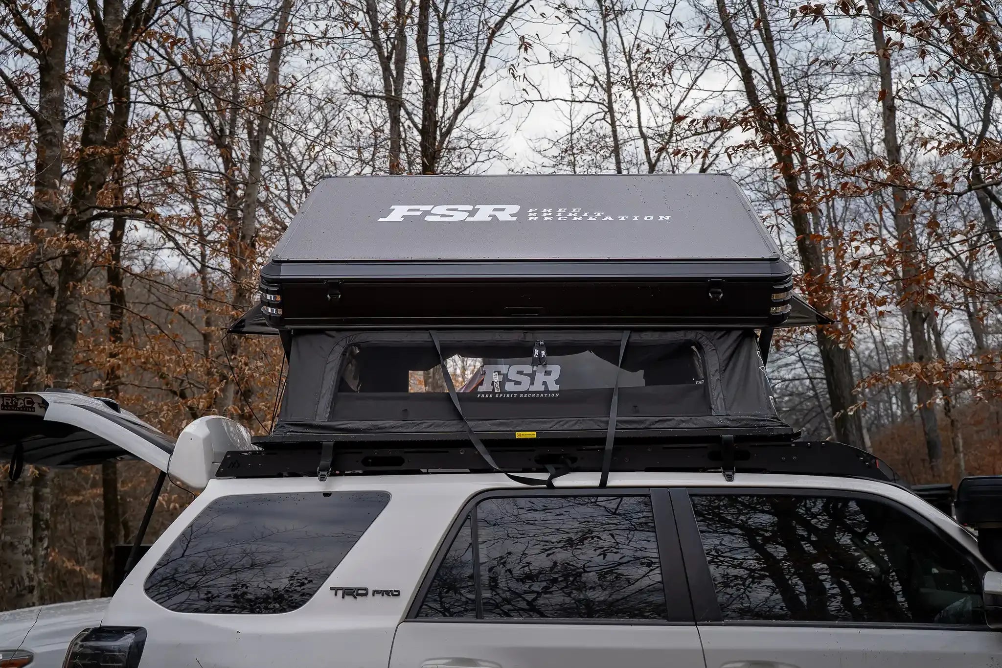 Freespirit Recreation Kali King rooftop tent set up on a vehicle, showcasing its spacious design for camping adventures.