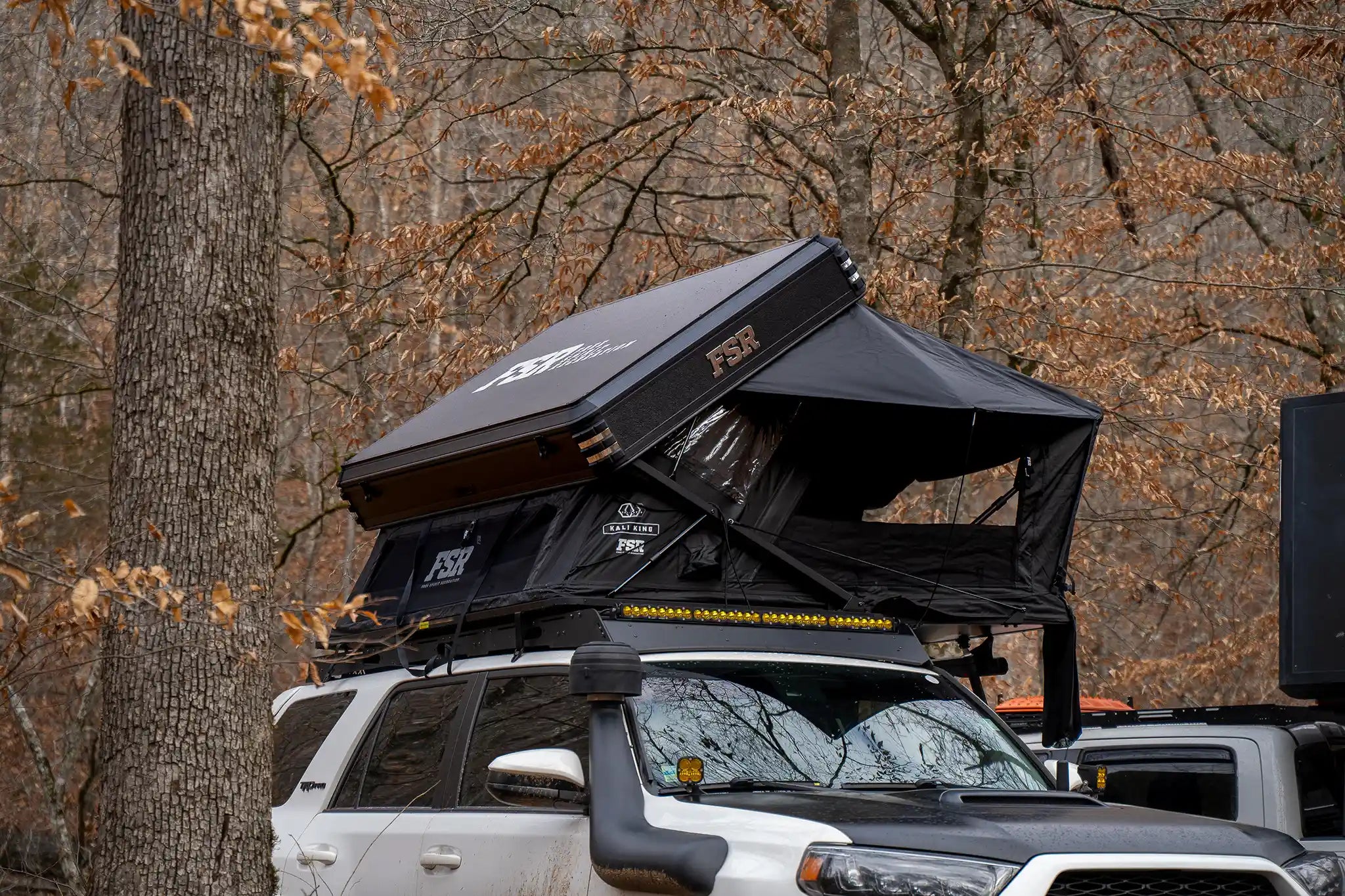Freespirit Recreation Kali King rooftop tent set up on a vehicle, showing its spacious design and durable fabric for outdoor camping.