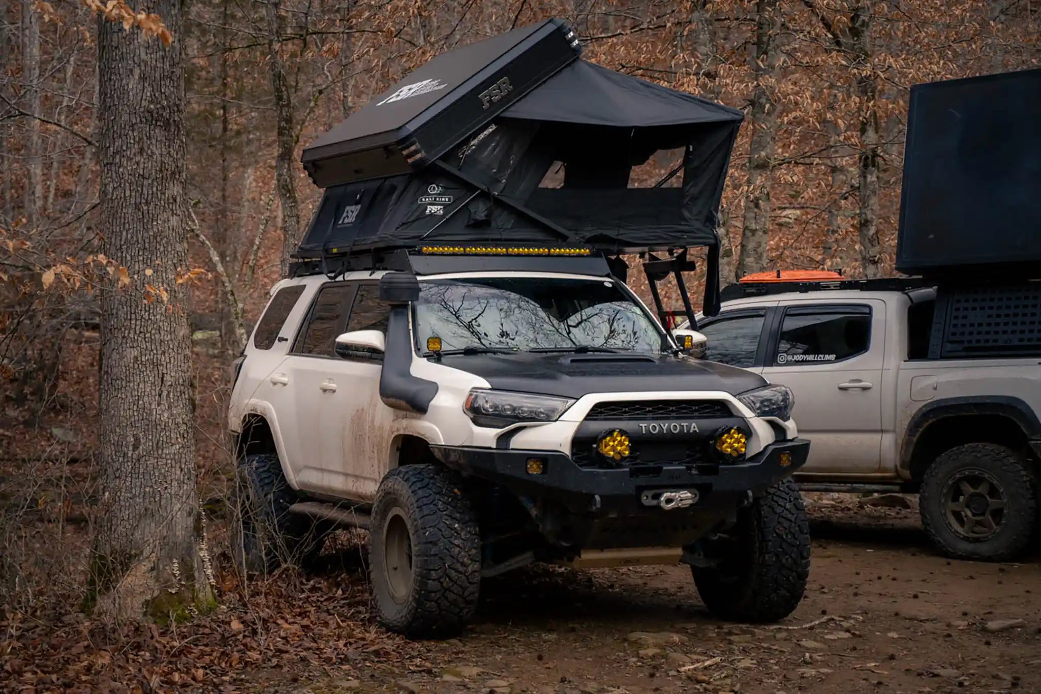 Freespirit Recreation Kali King rooftop tent installed on a vehicle, showcasing its durable fabric and elevated sleeping platform.