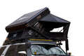 Freespirit Recreation Kali King rooftop tent set up on a vehicle, featuring durable fabric and comfortable sleeping area.