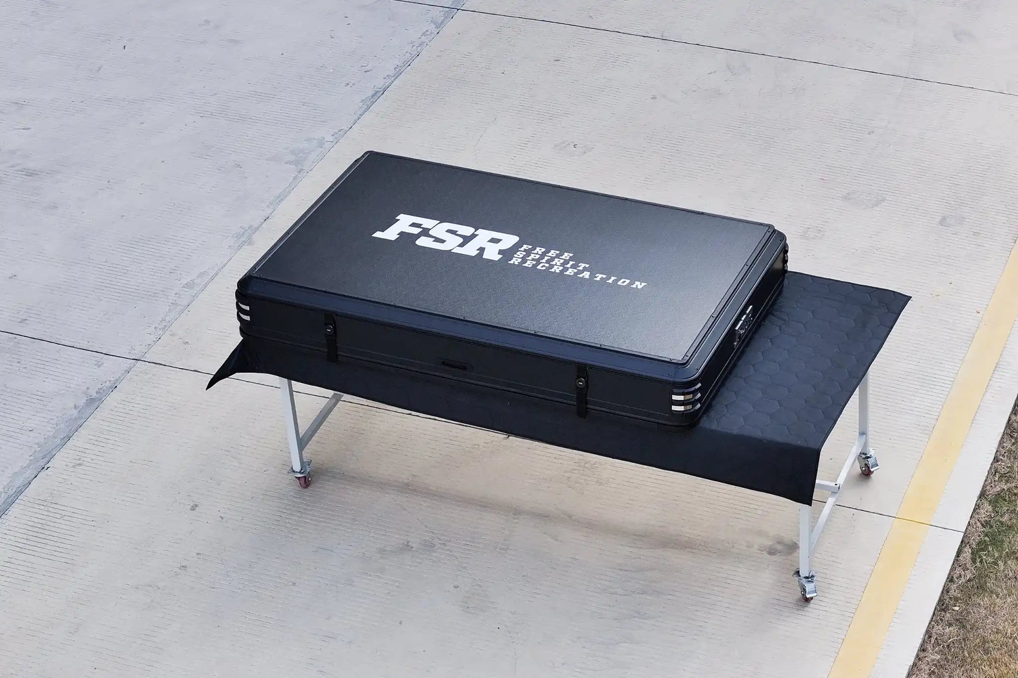 Freespirit Recreation Kali King rooftop tent in closed position, durable fabric and sturdy frame for outdoor camping adventures.