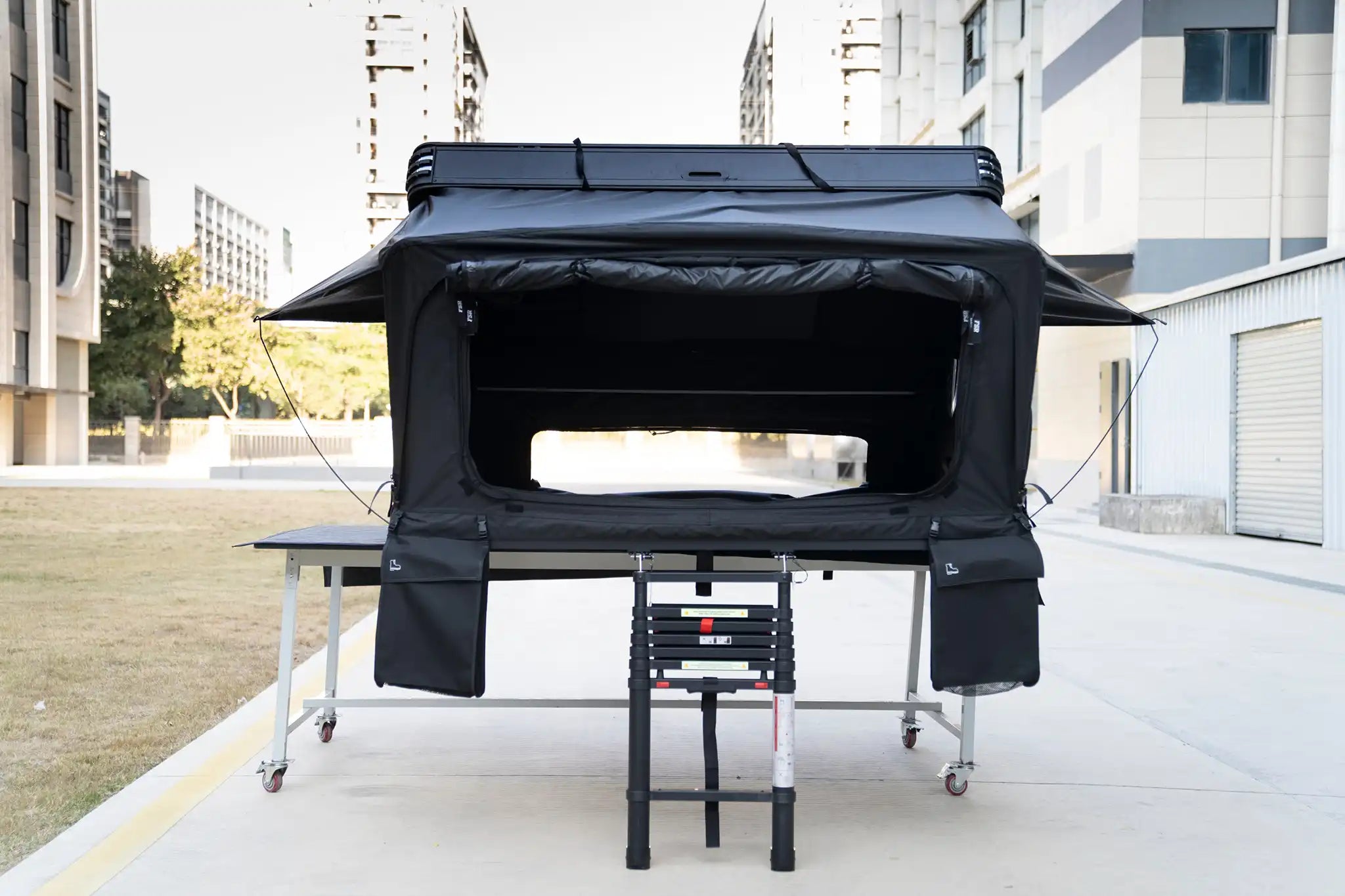 Freespirit Recreation Kali King rooftop tent open front view, showcasing its spacious design and sturdy build for outdoor camping.