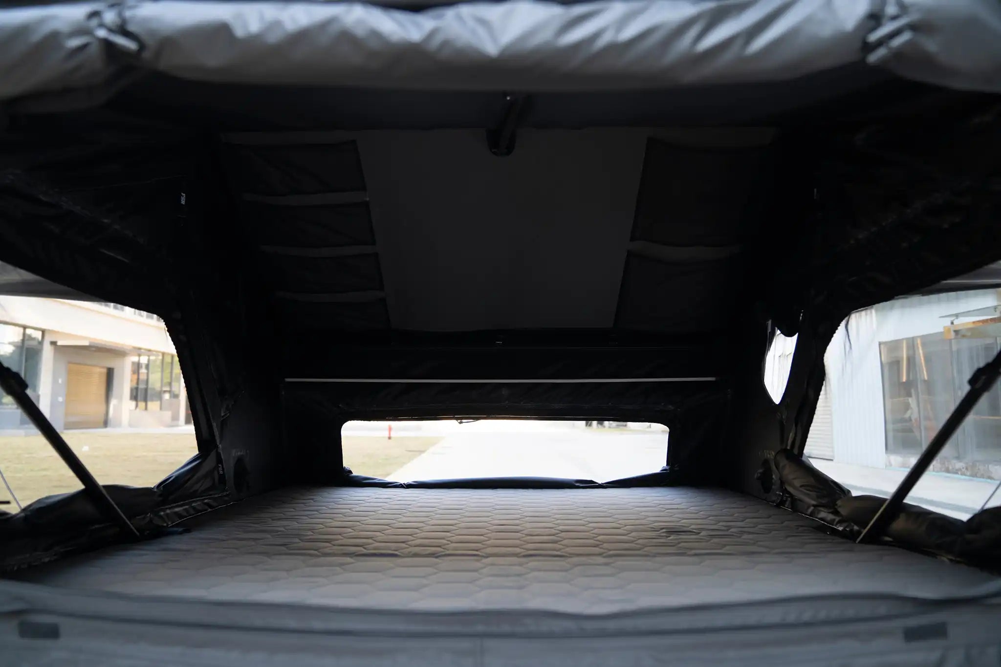 Interior view of Freespirit Recreation Kali King rooftop tent showing sleeping area and interior setup.