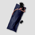 Cozy Cotton Flannel TravelSheet™ by COCOON, showing soft, lightweight fabric ideal for travel bedding and outdoor adventures.
