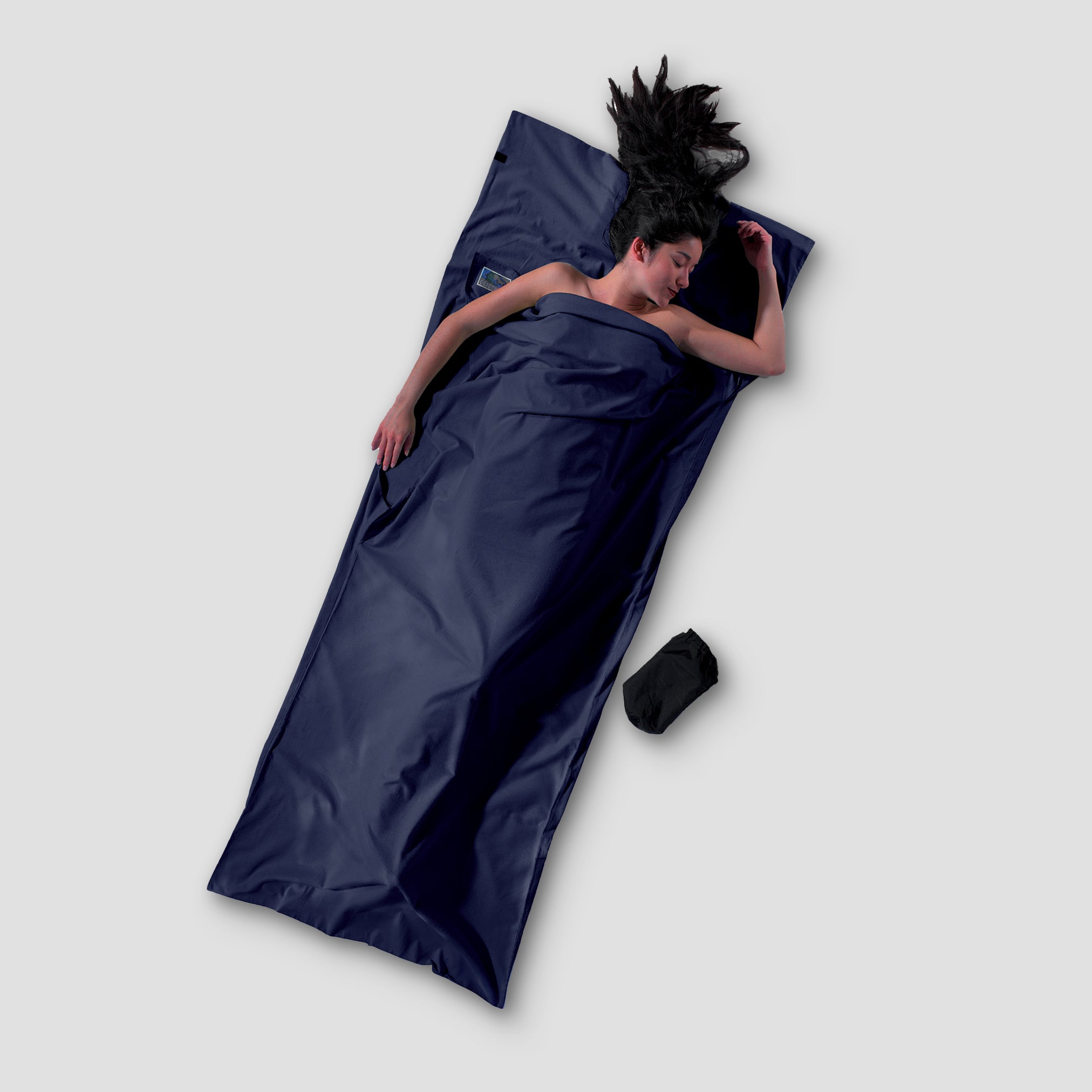 Cozy Cotton Flannel TravelSheet™ by COCOON, showing soft, lightweight fabric ideal for travel bedding and outdoor adventures.